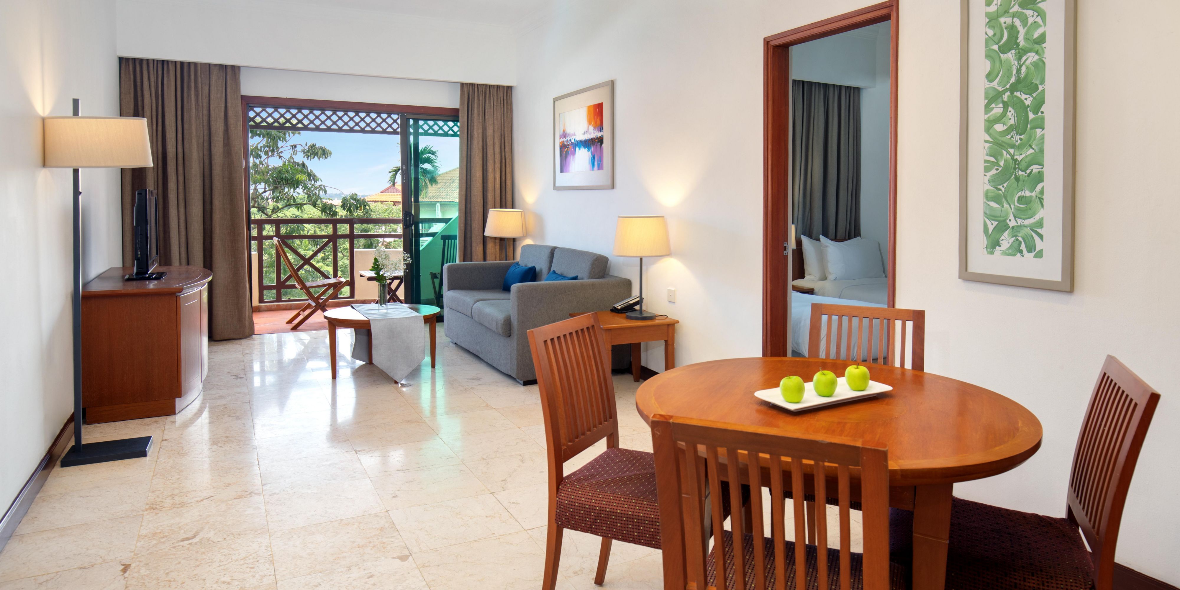 Comfy living room with swimming pool view