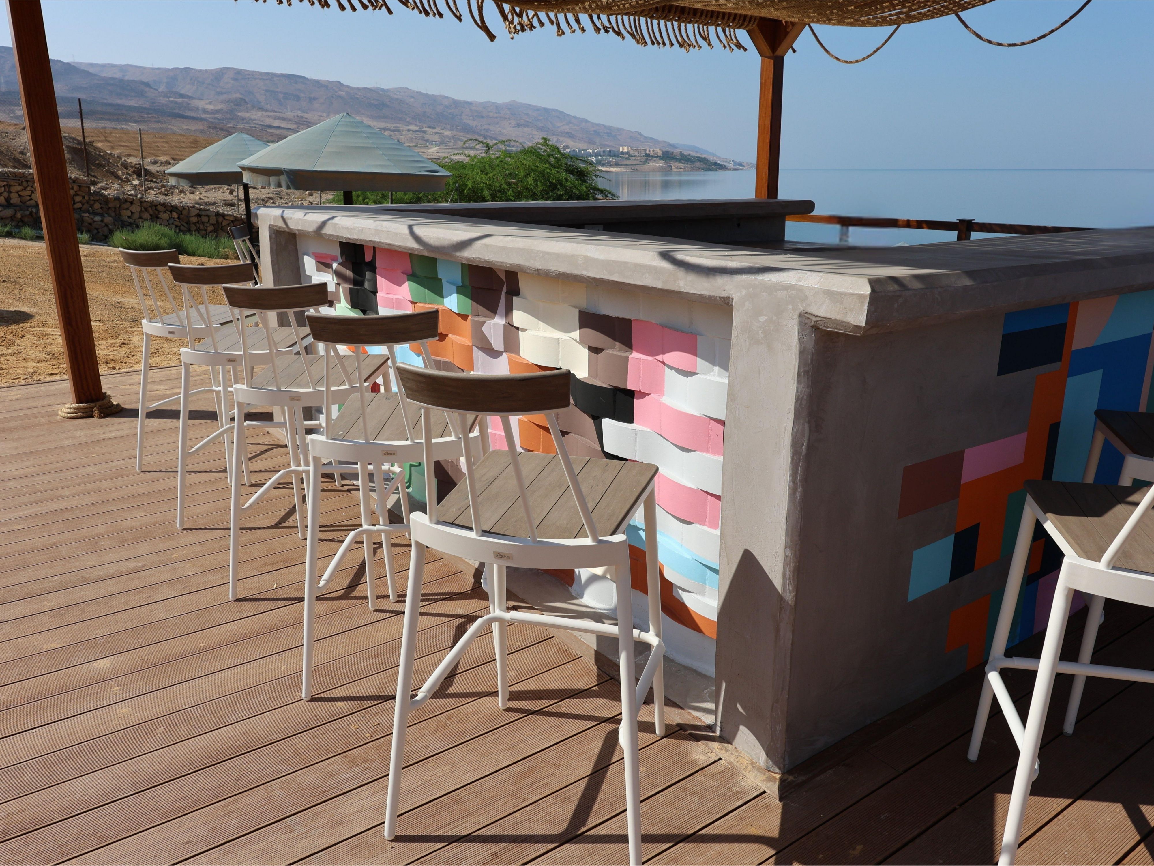 Better beach days await! Unwind at the brand-new Beach Bar, where every glass carries the calm of the shore and every sip comes with a stunning Dead Sea view.​
