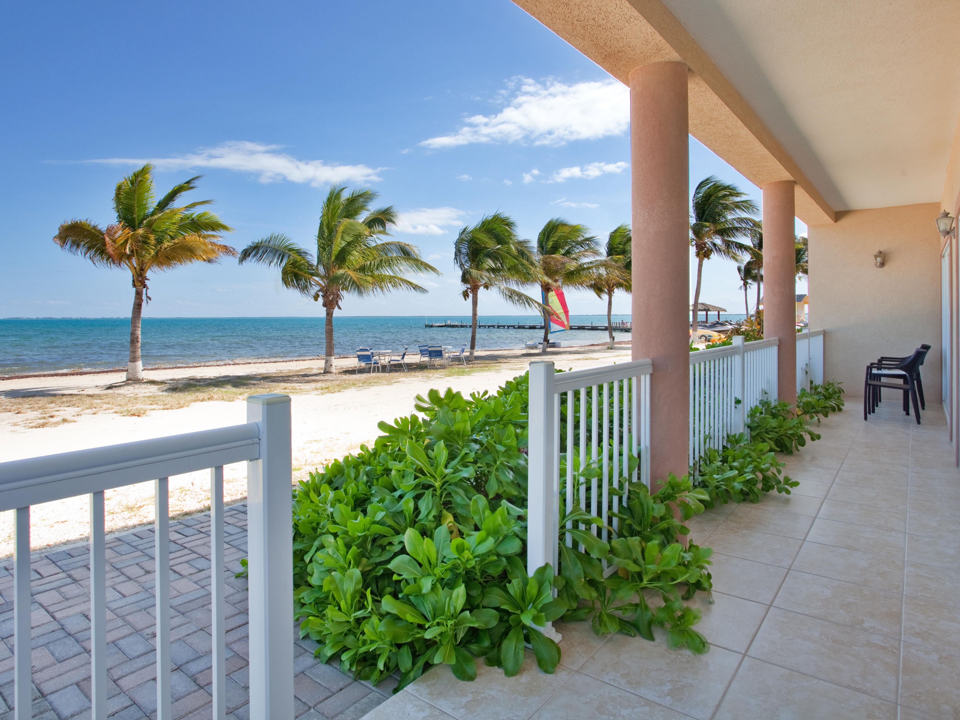 Among the largest accommodations in Grand Cayman, our four spacious 1,584 sq. ft. 2-bedroom Grand Villas feature a master suite with a king bed and en suite bath, a second bedroom with a queen bed and en suite bath, a dining room, living room with sleeper sofa, full kitchen with dishwasher, laundry room with washer and dryer, plus a private balcony