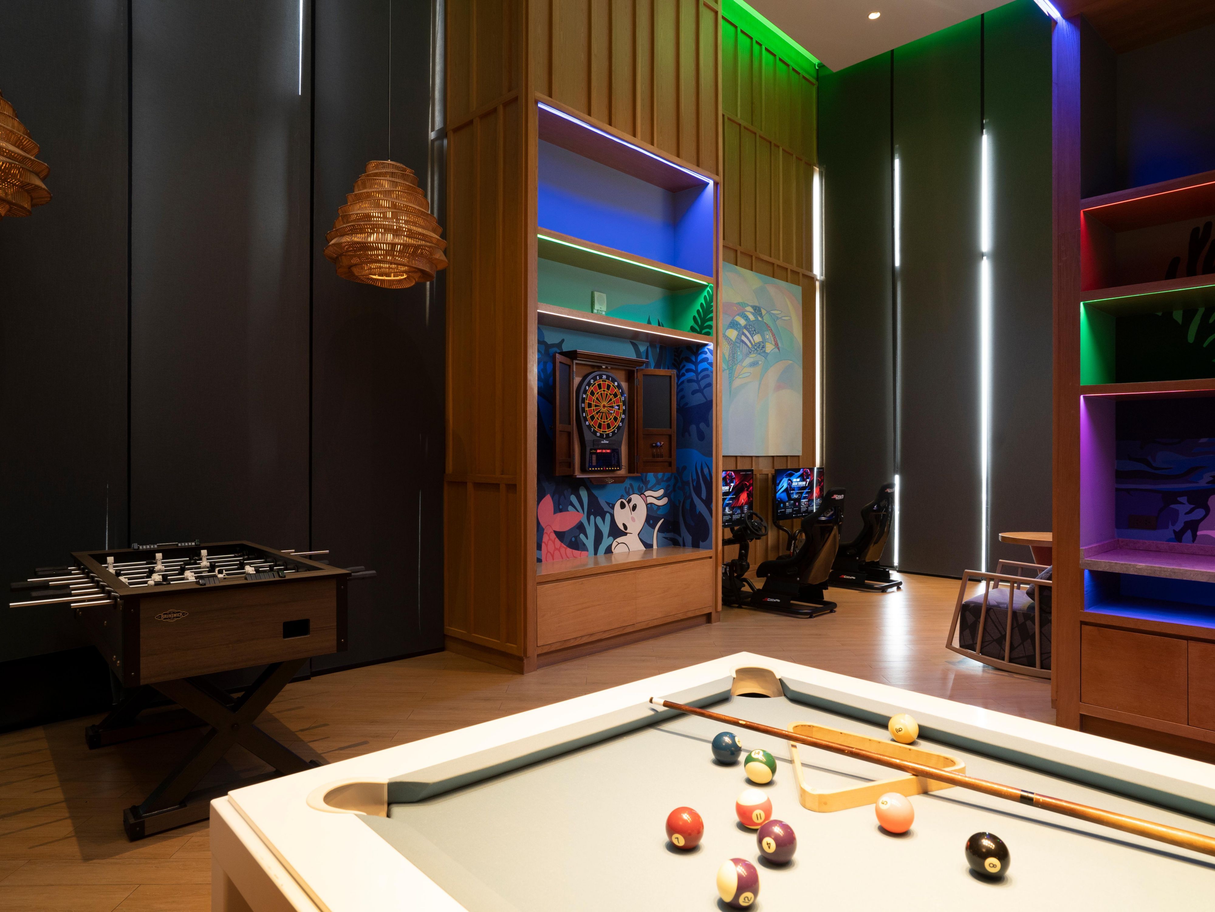 Discover endless fun and entertainment at the Vana Nava Games Room, located on the lobby floor of the hotel! This innovative games room offers a wide range of exciting activities, including PS5, racing, pool, and interactive experiences suitable for all ages. No matter your age, the Vana Nava Games Room has something for everyone to enjoy!