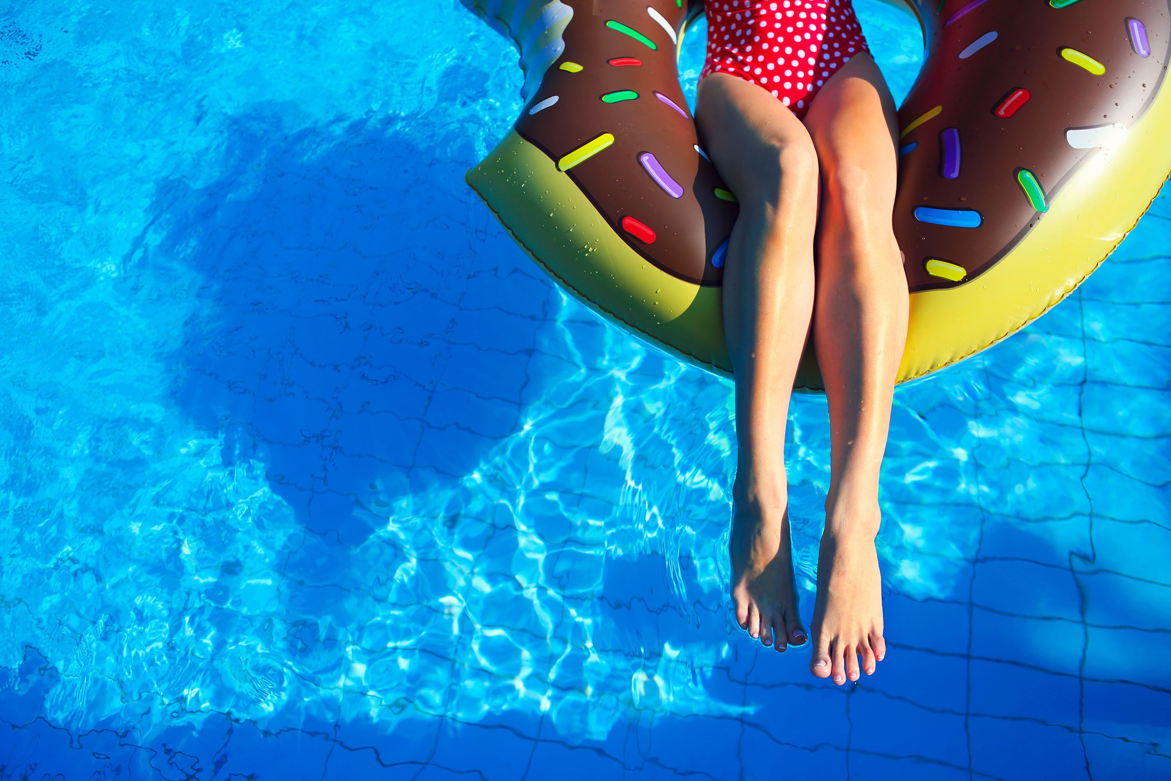 person on floatie in pool