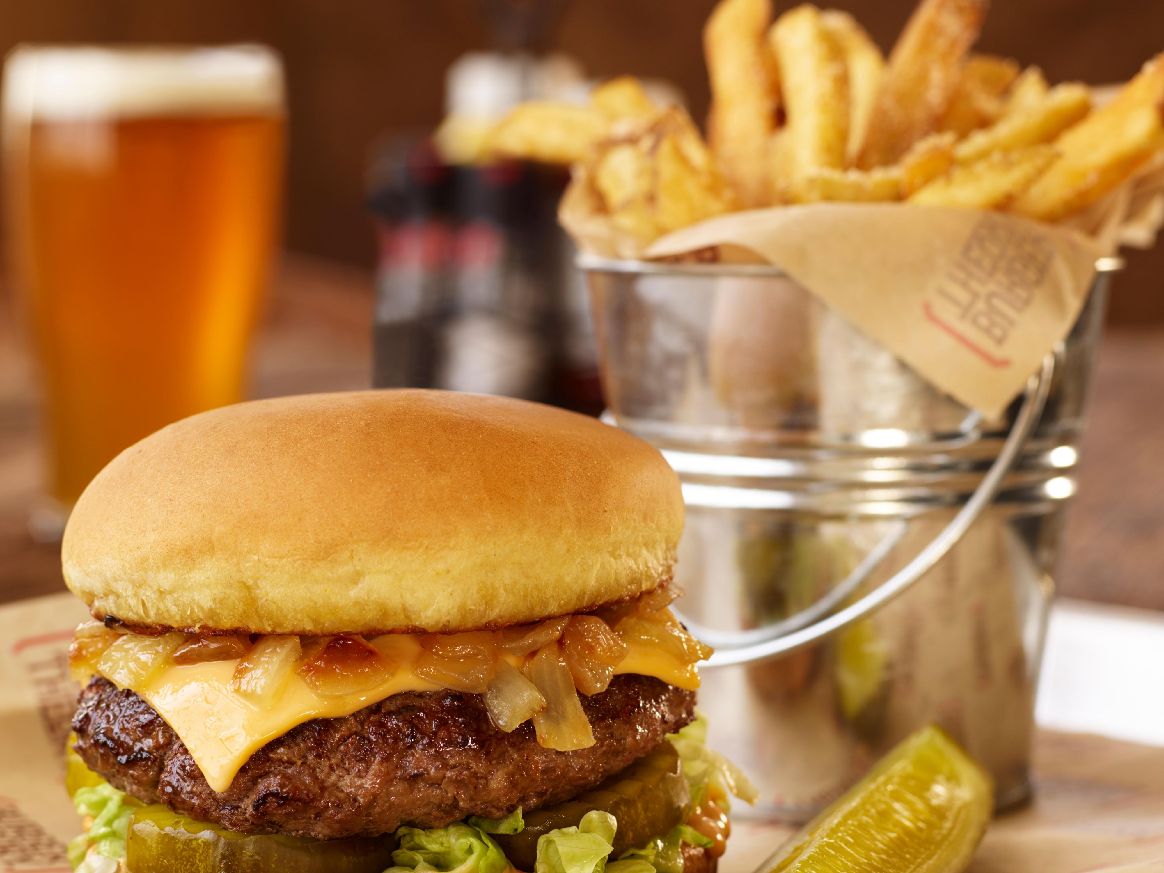 Savor mouthwatering burgers, crisp salads, and crave-worthy appetizers at Burger Theory, our on-site restaurant. Customize your perfect burger with a variety of fresh toppings, and pair it with a local draft or cocktail from the full bar. Whether you're dining solo or with family, it's the perfect place to unwind and enjoy a delicious meal.
