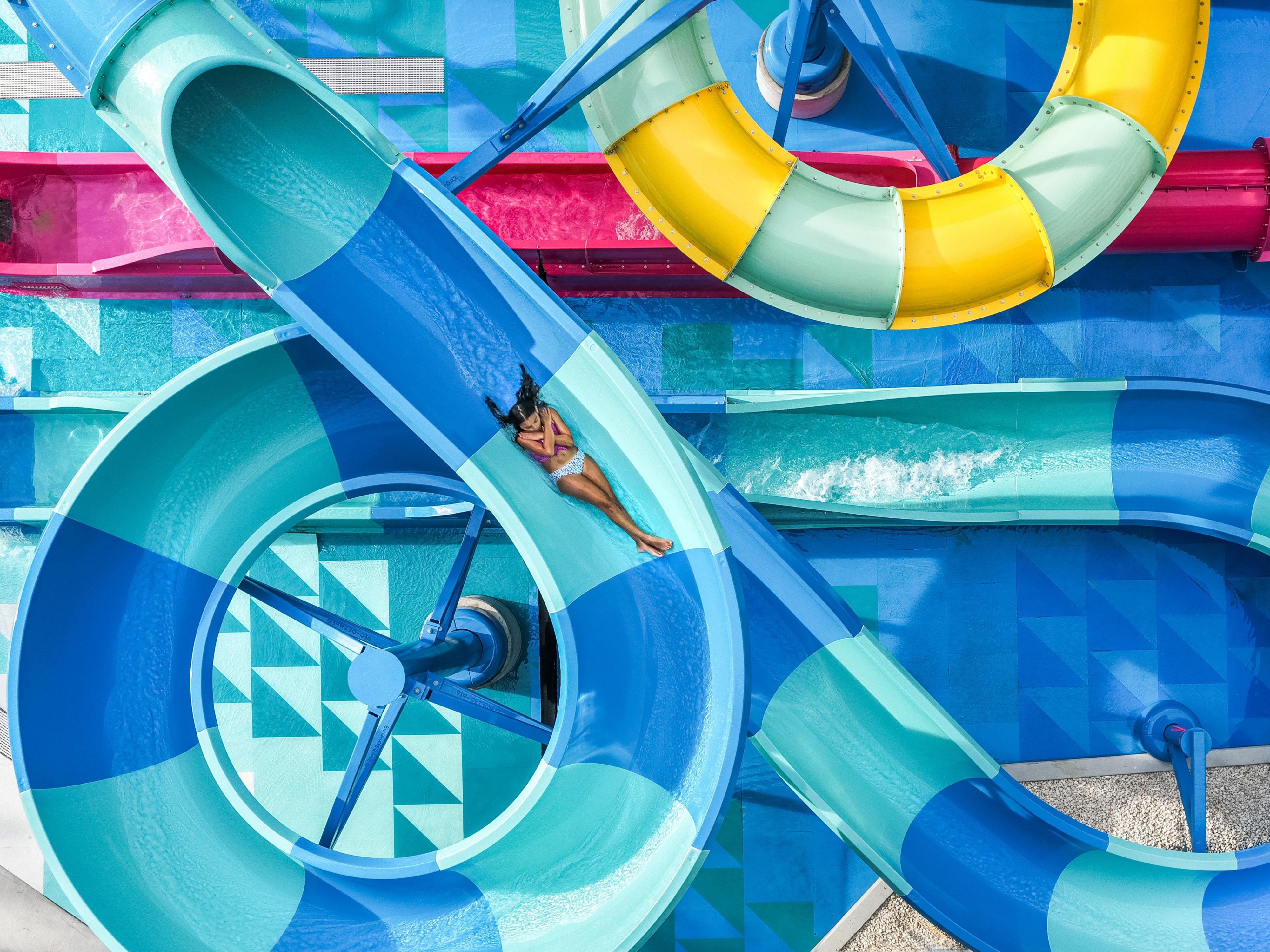 Guest going down a slide at a waterpark