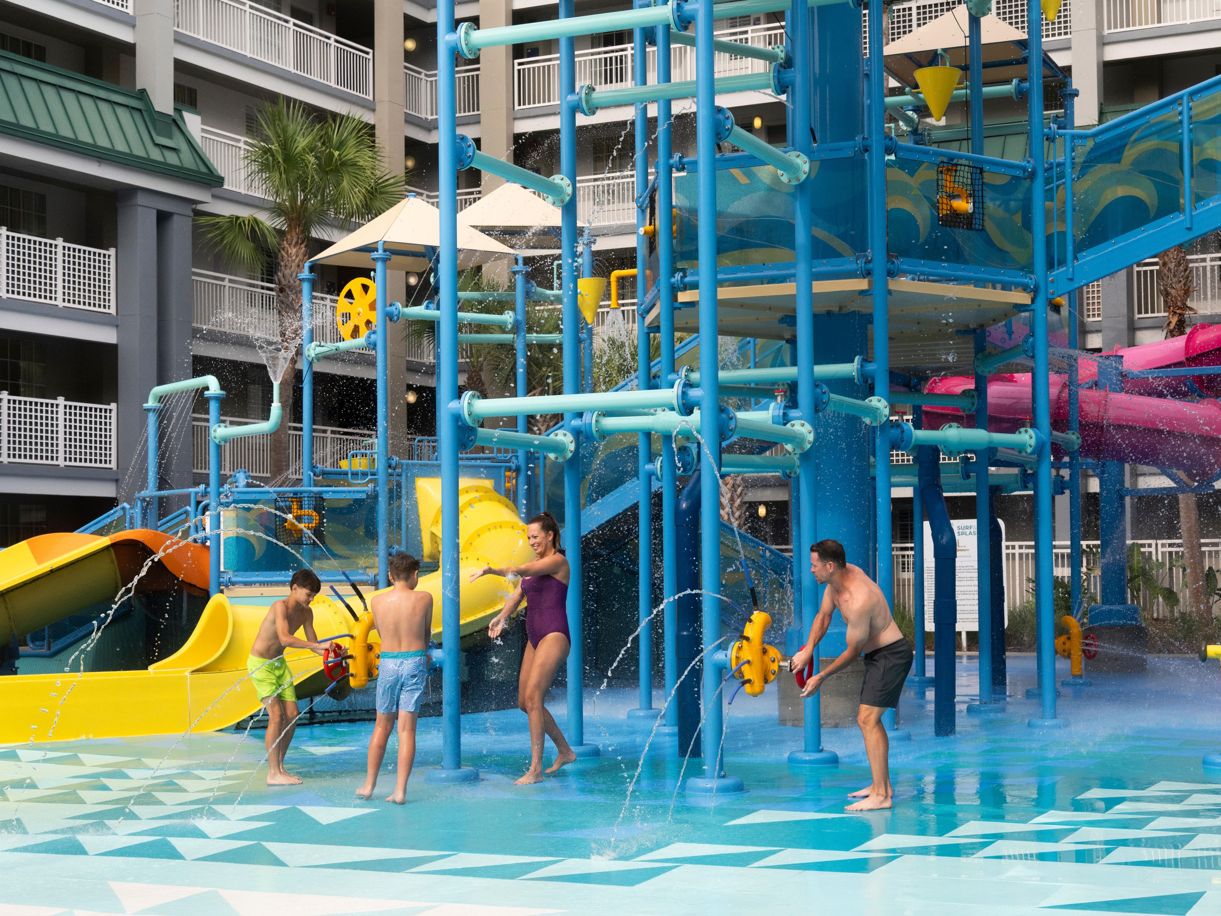 Aqua Cove water park with a play area