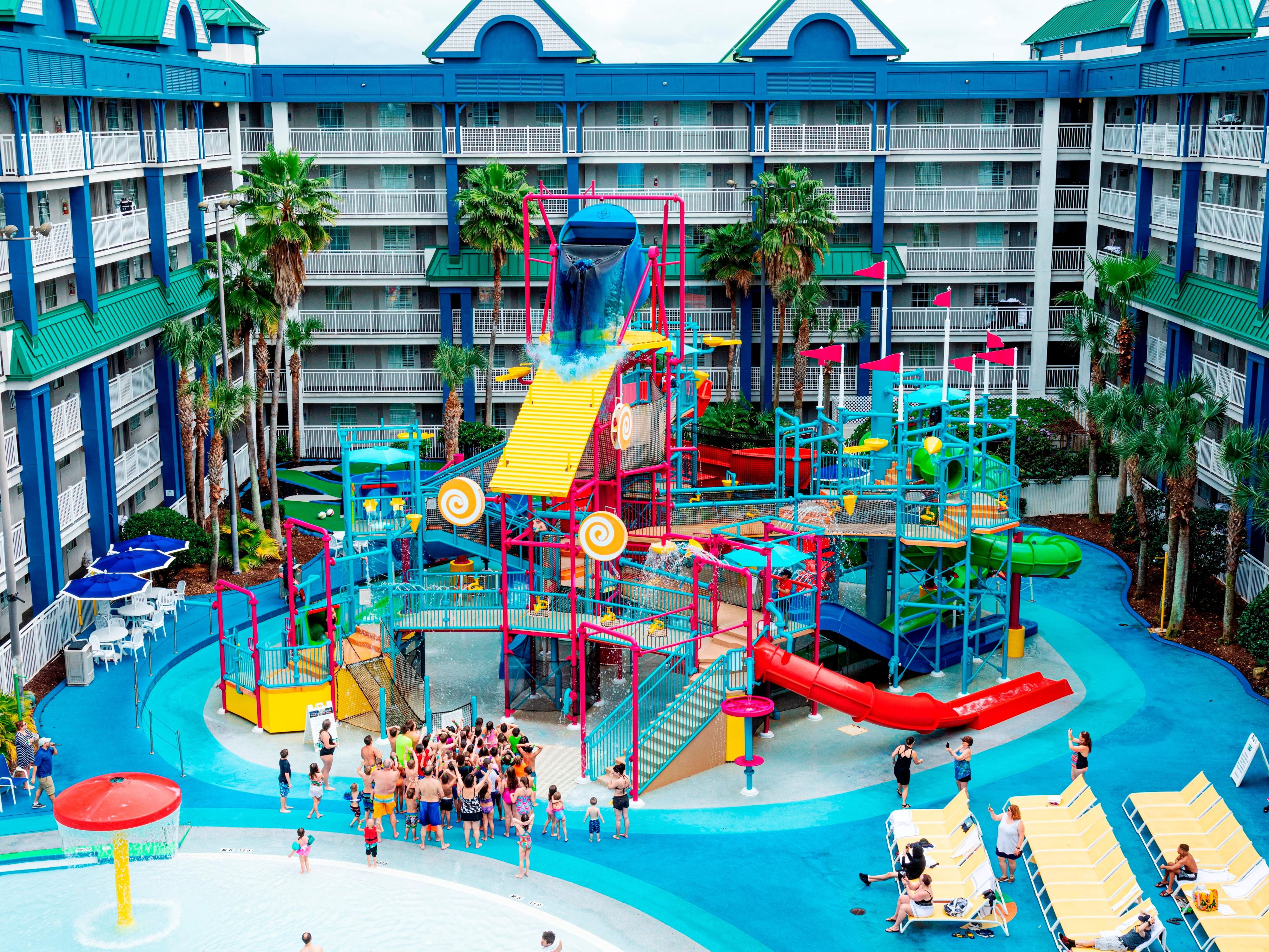 Our family resort is home to the Surf & Splash Orlando Waterpark with our large Splash pool, water slides, fun poolside activities, a 9-hole mini golf course and more. Also, be sure to join us in our Marketplace for our expansive arcade, multiple dining options and daily theater shows. All the fun is included for up to 6 guests per suite.