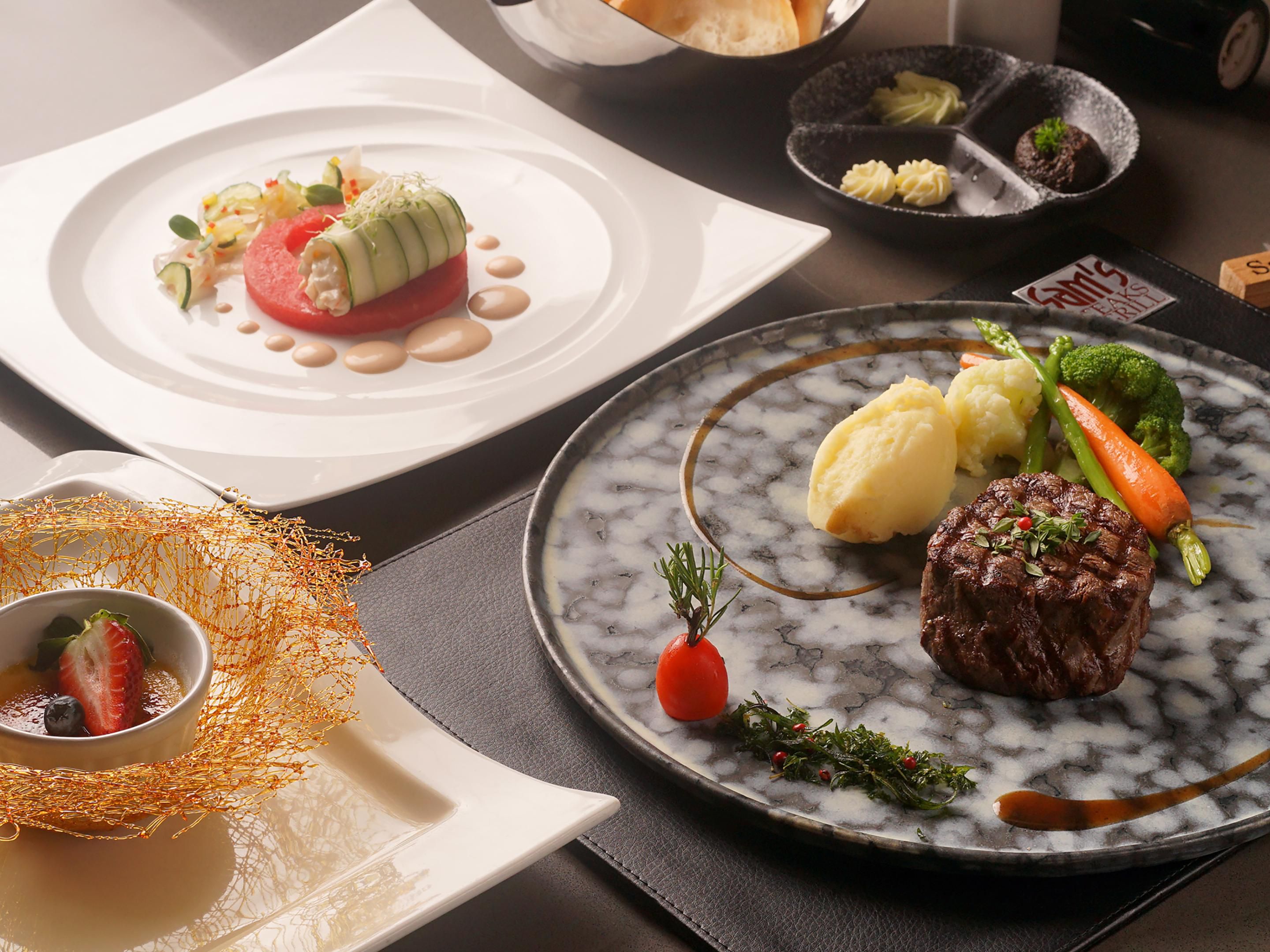 Serving up the finest cuts of prime imported steaks, Sam's Steaks & Grill provides top cuisine in a sophisticated setting. Our carefully crafted menus are complemented by an extensive selection of old and new wines – perfect for an intimate dinner for two.