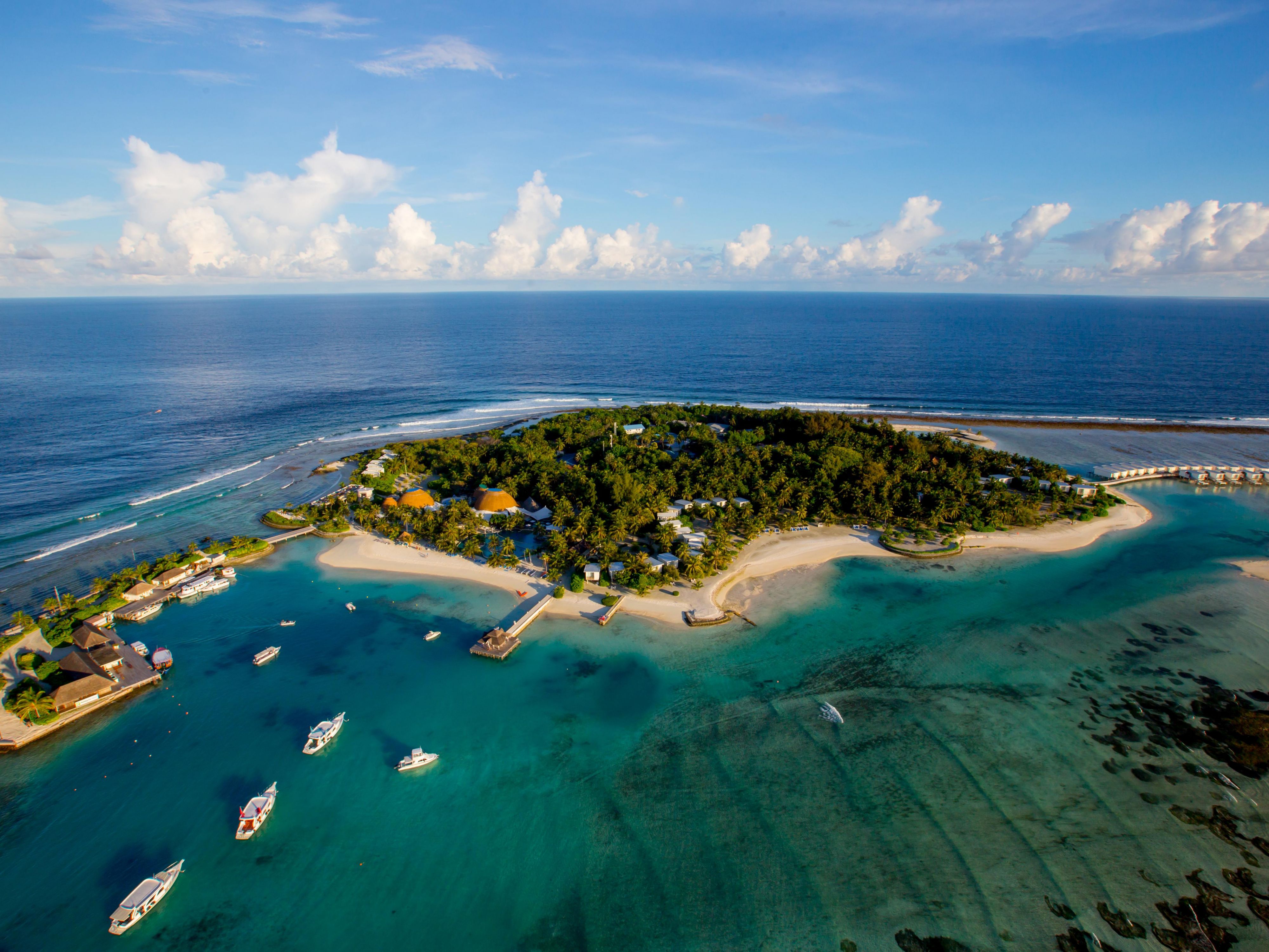 Located on Kandooma Fushi, a private island, the resort is a short boat ride from Velana International Airport. Guests can opt for shared or private boat transfers to access the resort. Boat transfers will also have to be pre-arranged directly with the hotel at additional costs.