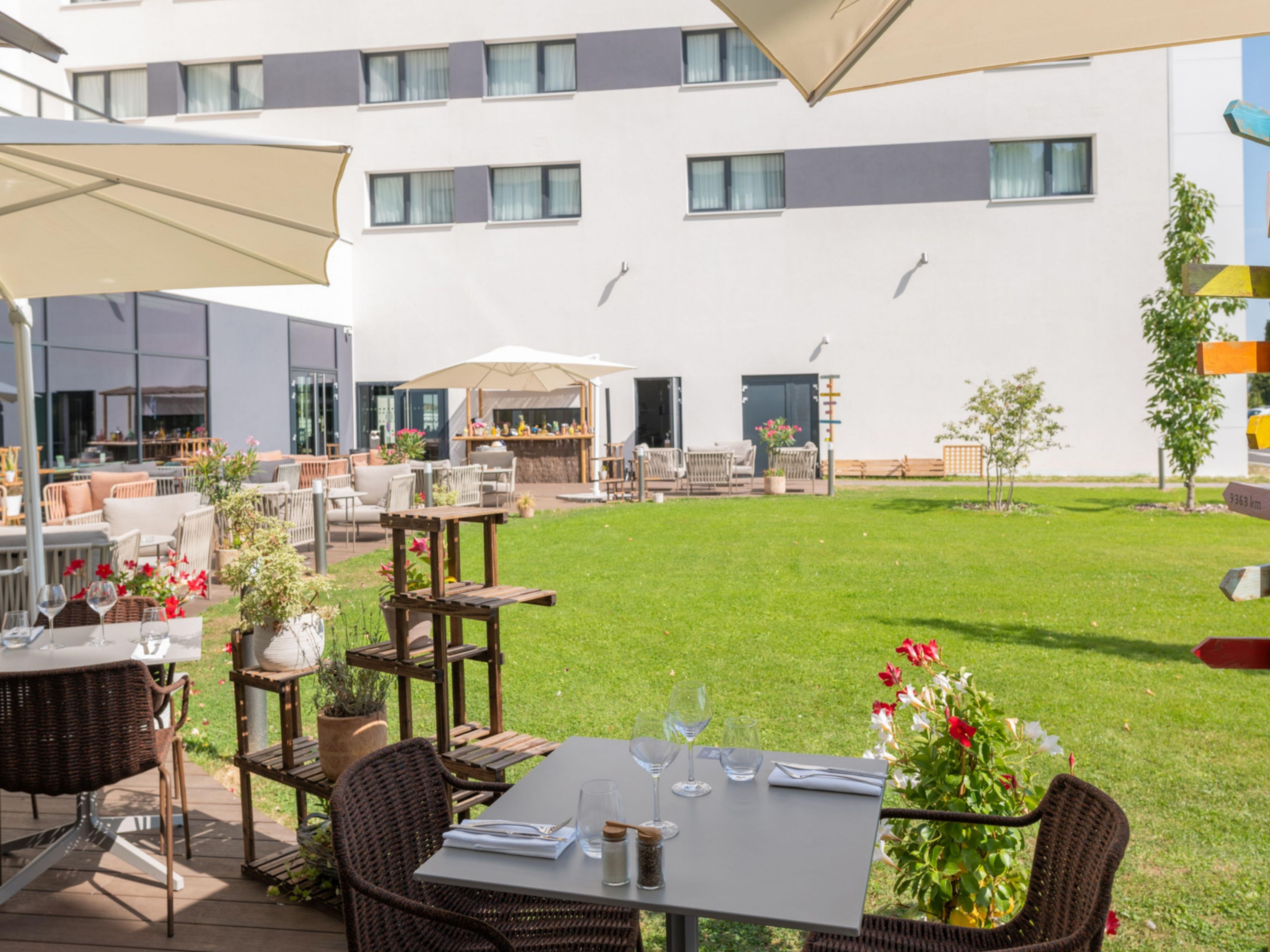 Relax on the hotel’s outdoor terrace and enjoy drinks 
