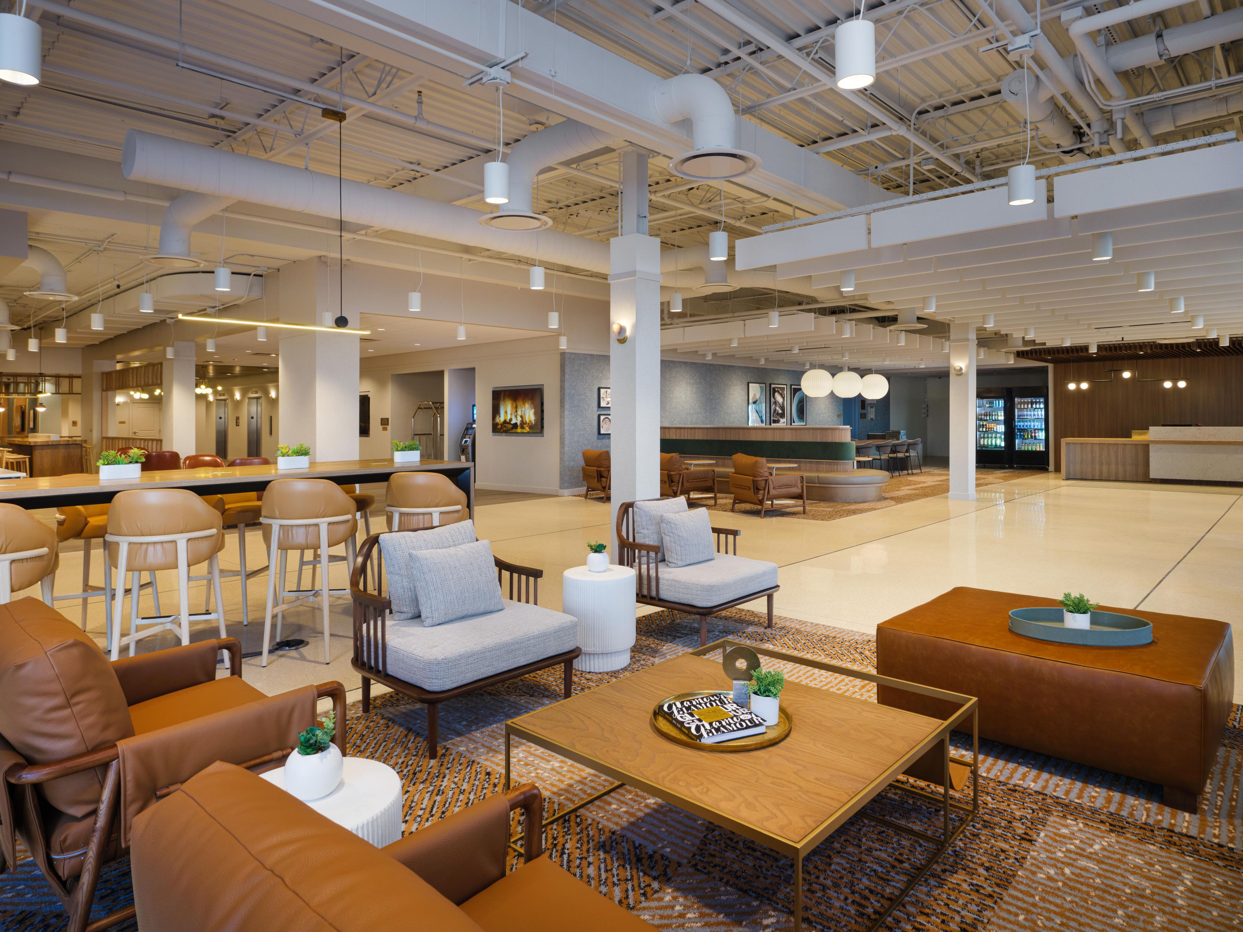 Welcome to our modern style hotel lobby with inviting decor & WiFi