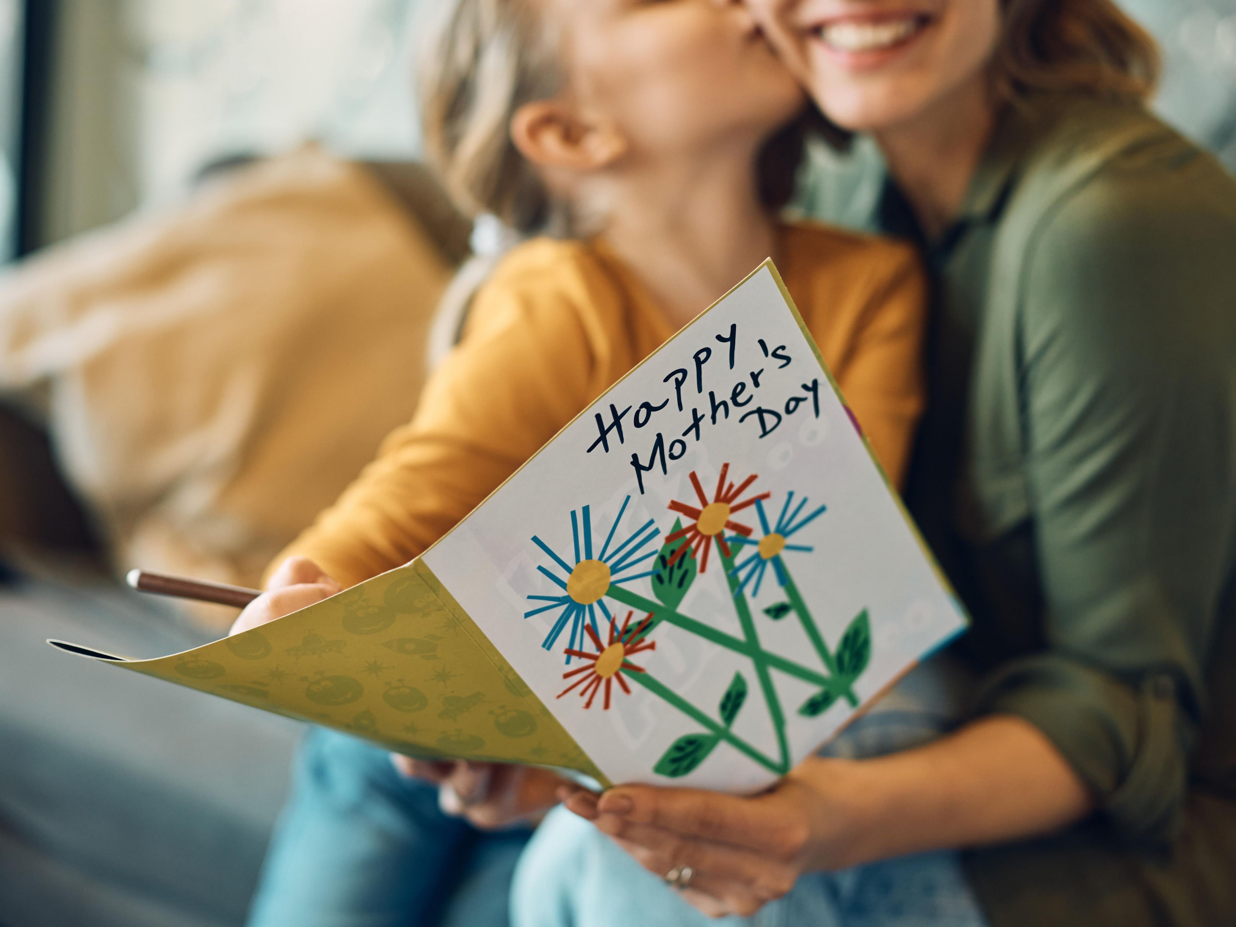 Mother with a Mother's Day Card from her dauther