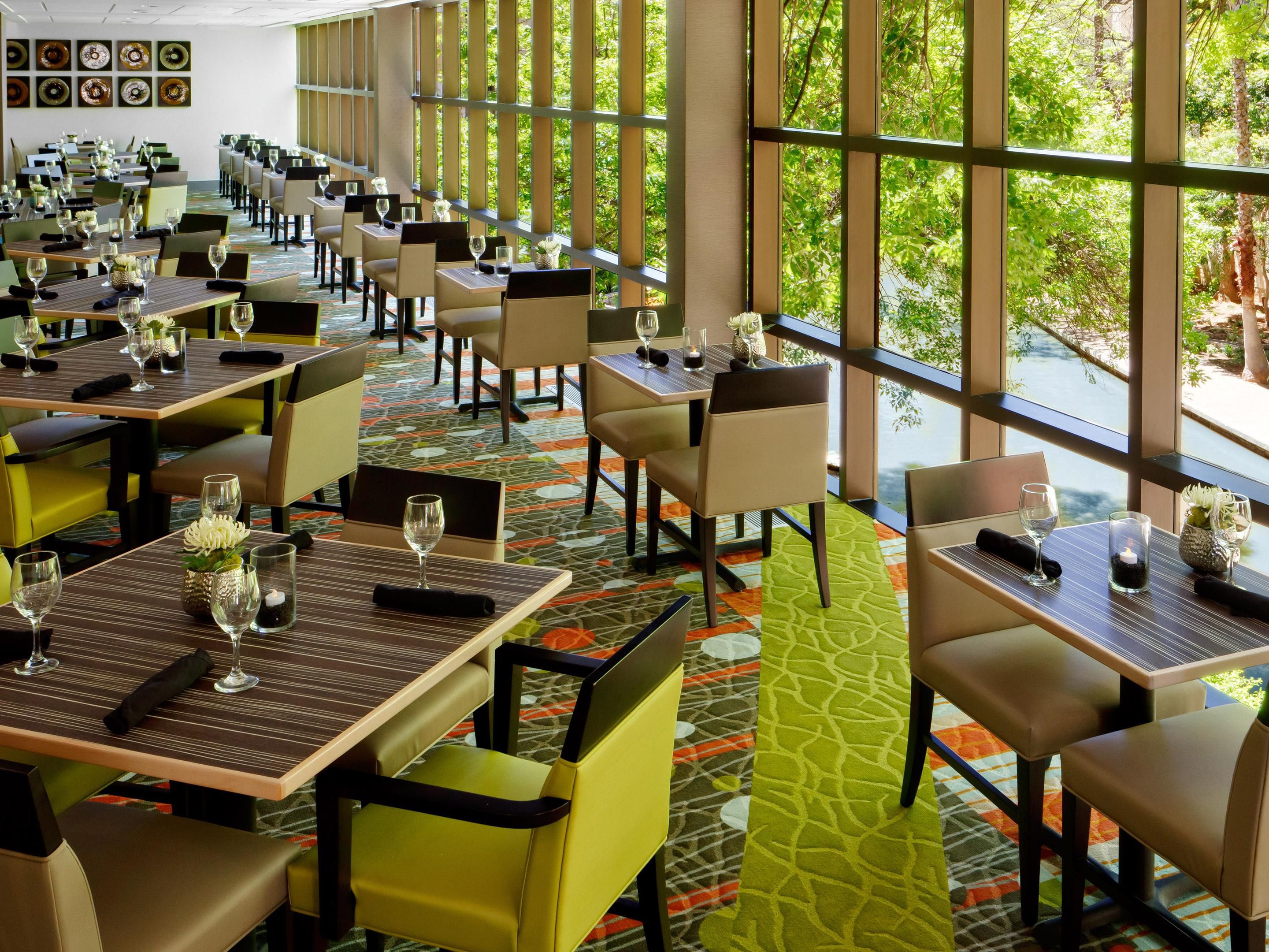 Experience an authentic San Antonio dining experience with views of the Riverwalk at Windows on the River. Our two-level restaurant and lounge offer mouthwatering Tex-Mex cuisine, including fire-grilled steaks, wine, beer, and signature cocktails. Try the famous Firecracker Shrimp with a strawberry mojito in a contemporary setting.