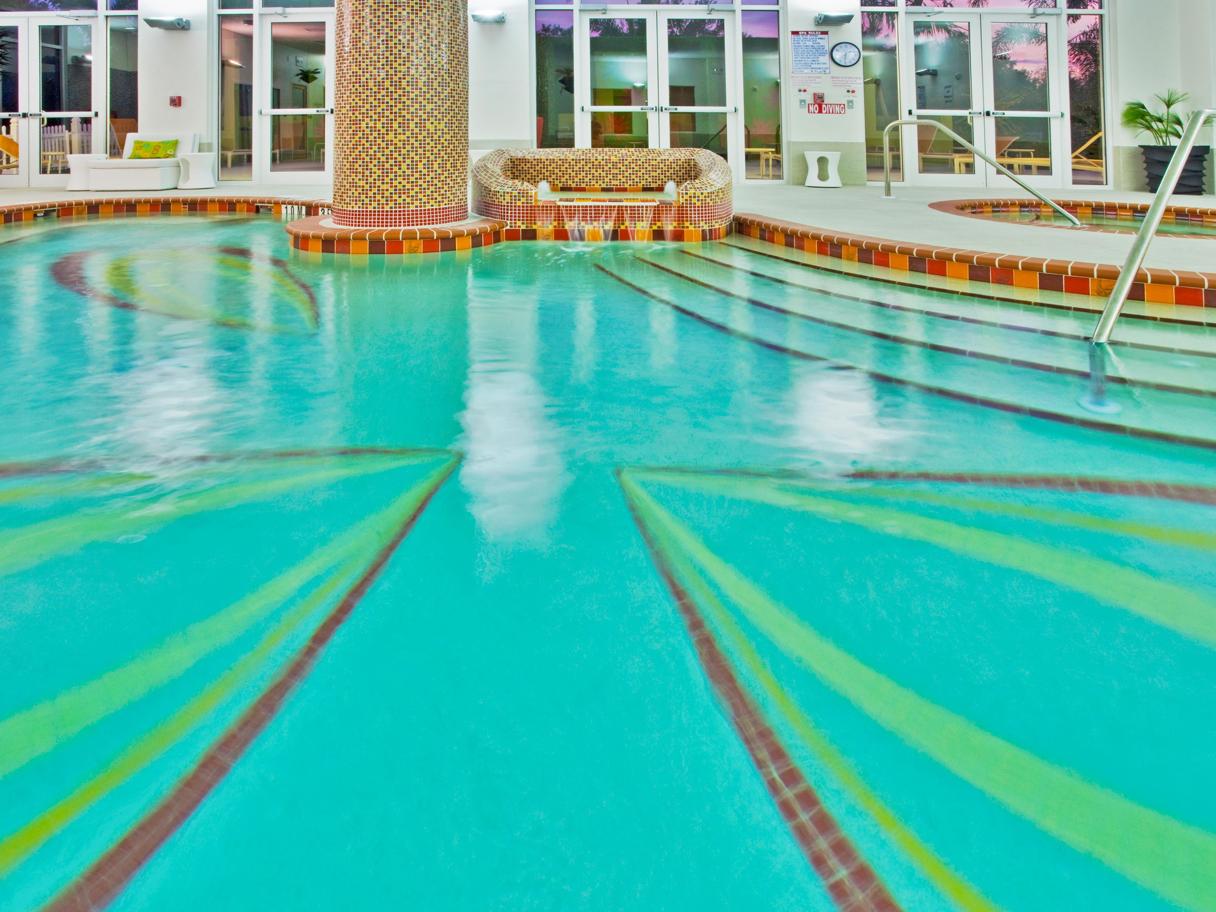 Located on the ground floor of our property, our pool area features a heated indoor pool and a hot tub — perfect no matter the weather any day! Our pool area is open daily from 9 AM - 10 PM.