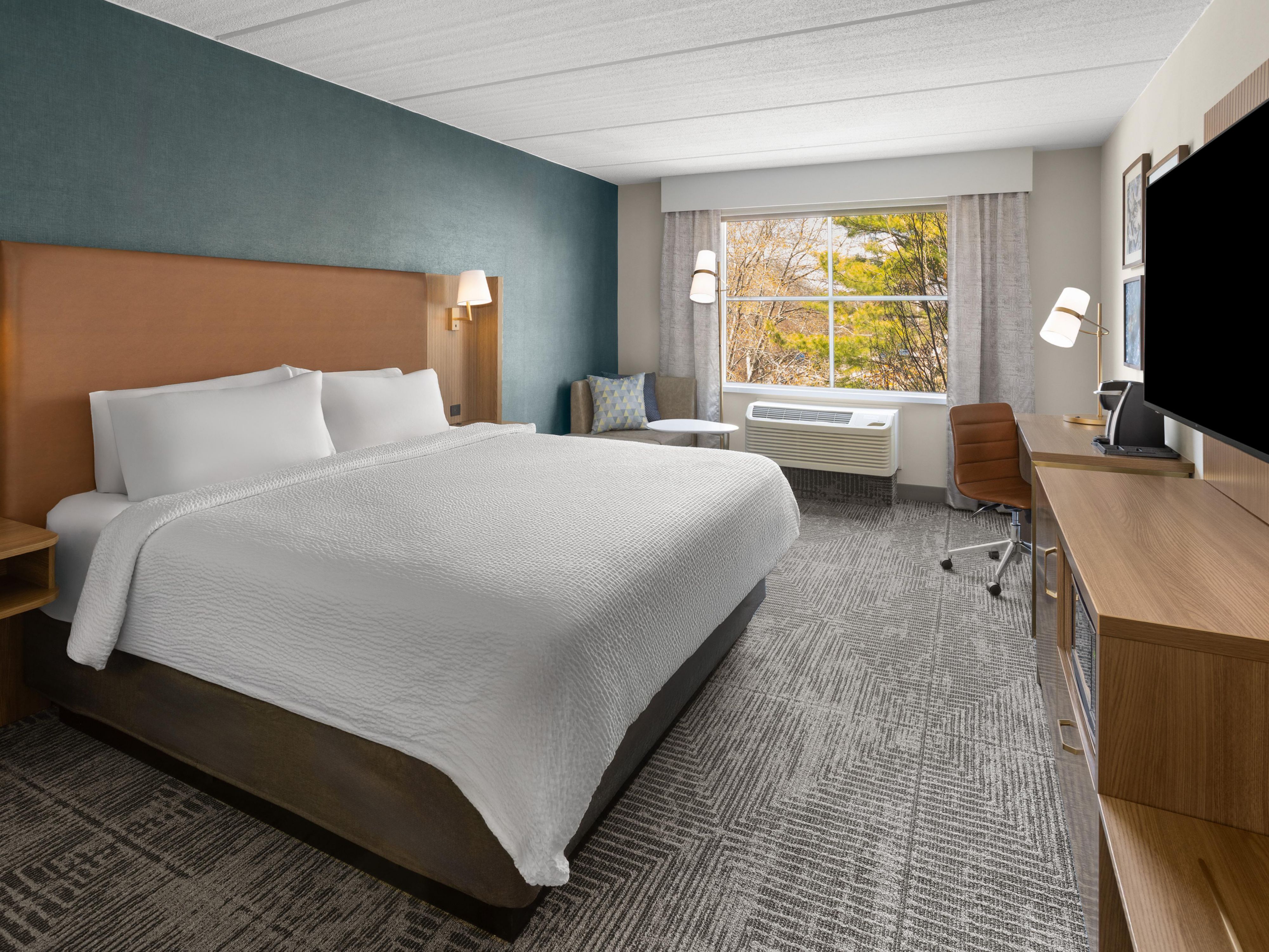 King Size Bed Guestroom w/ 55" smart TV and Keurig Coffeemaker.