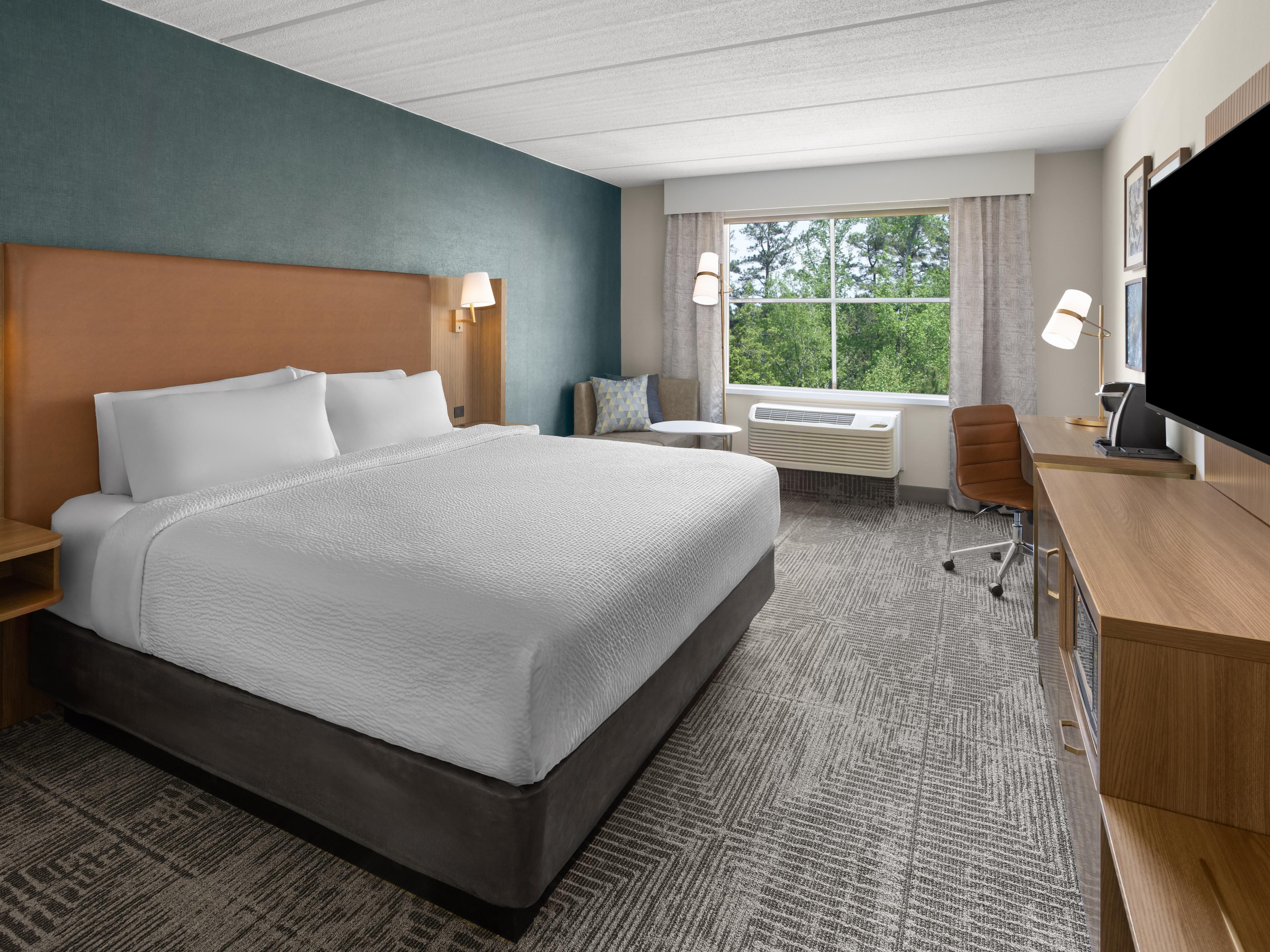 Enjoy our Spacious King Bed Guestrooms- the perfect getaway!