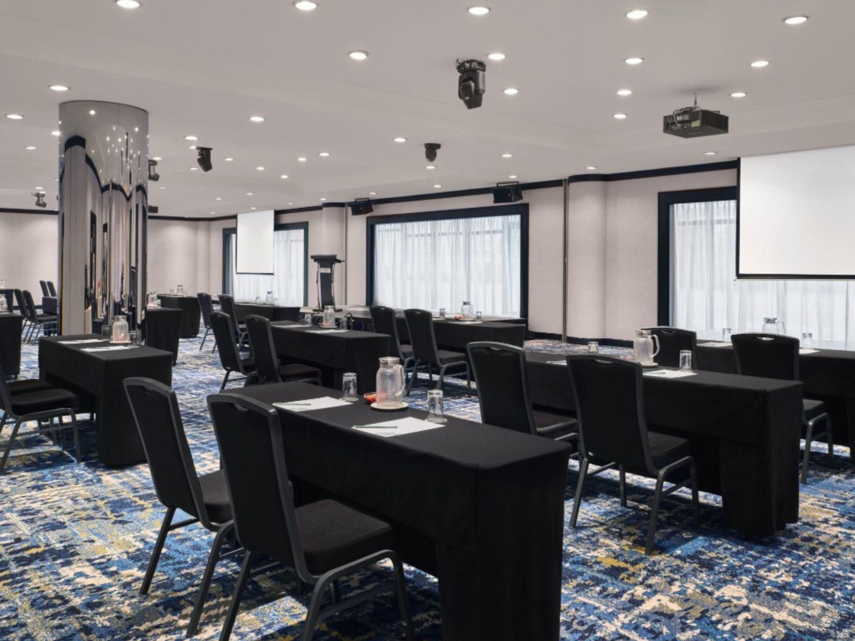 Image 81: Evolve your event. Curate a connection. 10% off* meetings & events until March 2026. Book by 31 August 2025. That's every meeting, conference and event with Holiday Inn Singapore Atrium. Enjoy personalised and flexible experiences, coupled with exclusive 3X IHG Business Rewards.