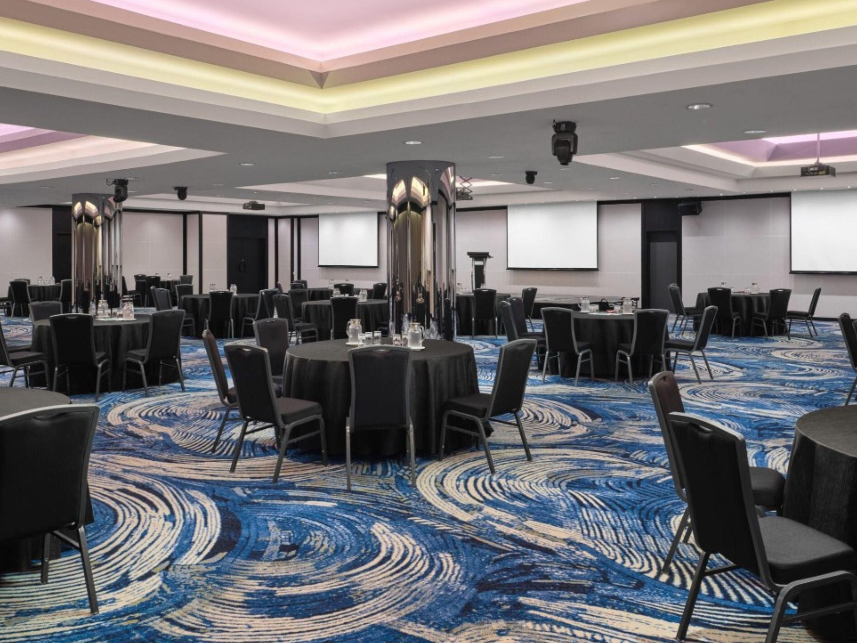 Host flawless events in our 18,567 square feet of meticulously designed meeting space. With 13 versatile venues for up to 400 guests, our facilities feature free Wi-Fi, live feed streaming, and intelligent lighting. From intimate gatherings to grand celebrations, we turn ordinary occasions into extraordinary experiences.