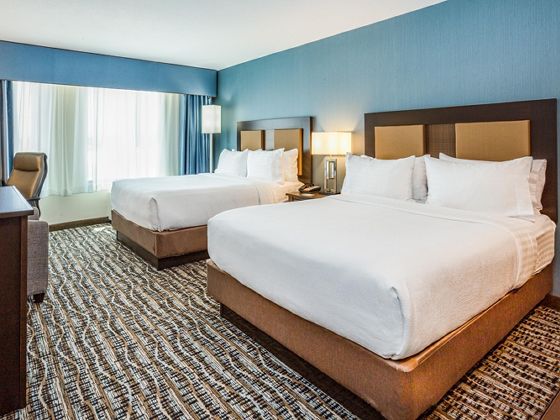 Relax in our triple-sheeted cotton bedding and feel pampered.