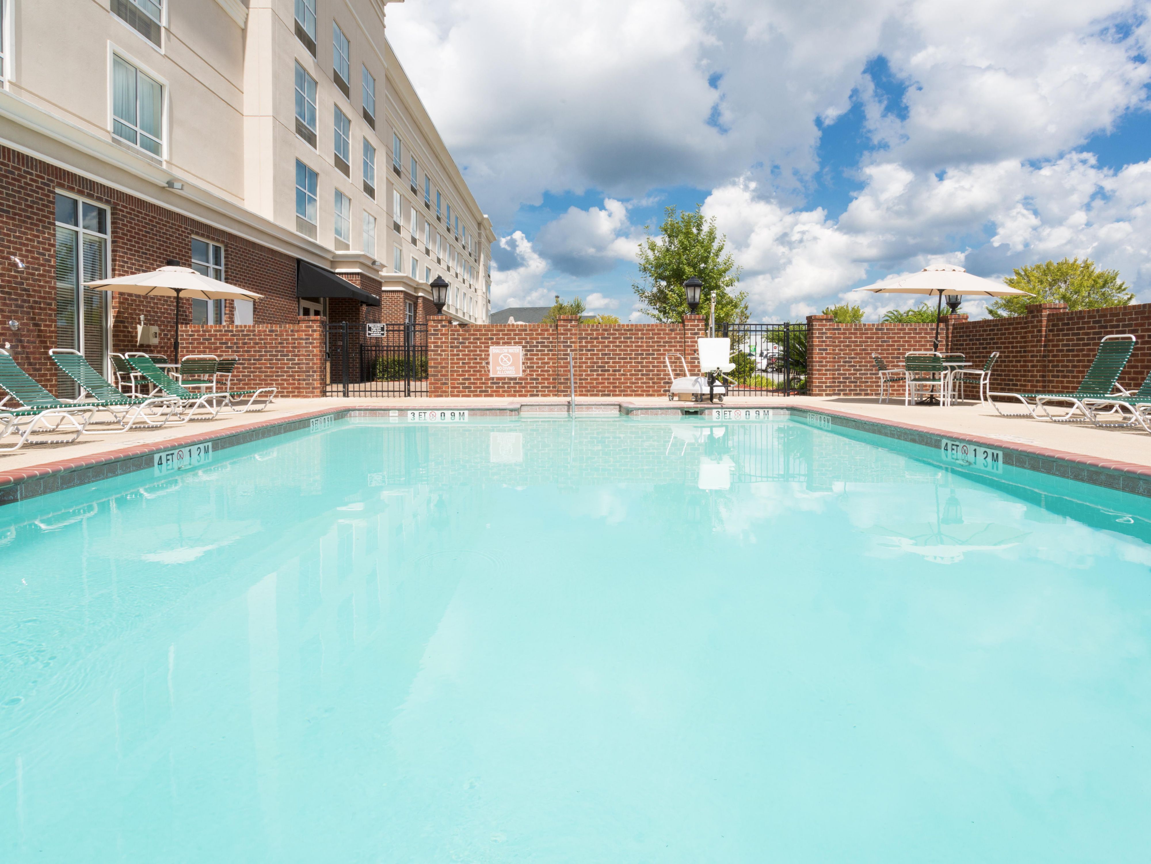 Relax by our outdoor pool at the Holiday Inn Statesboro