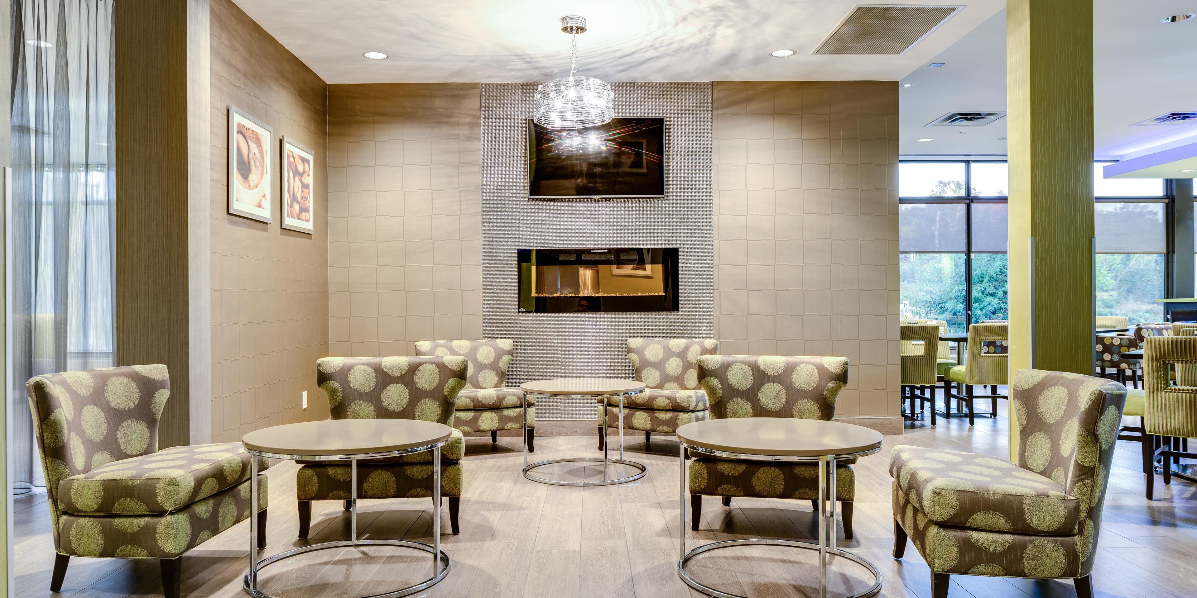 Relax By The Warm Fireplace at the Rendezvous Lounge