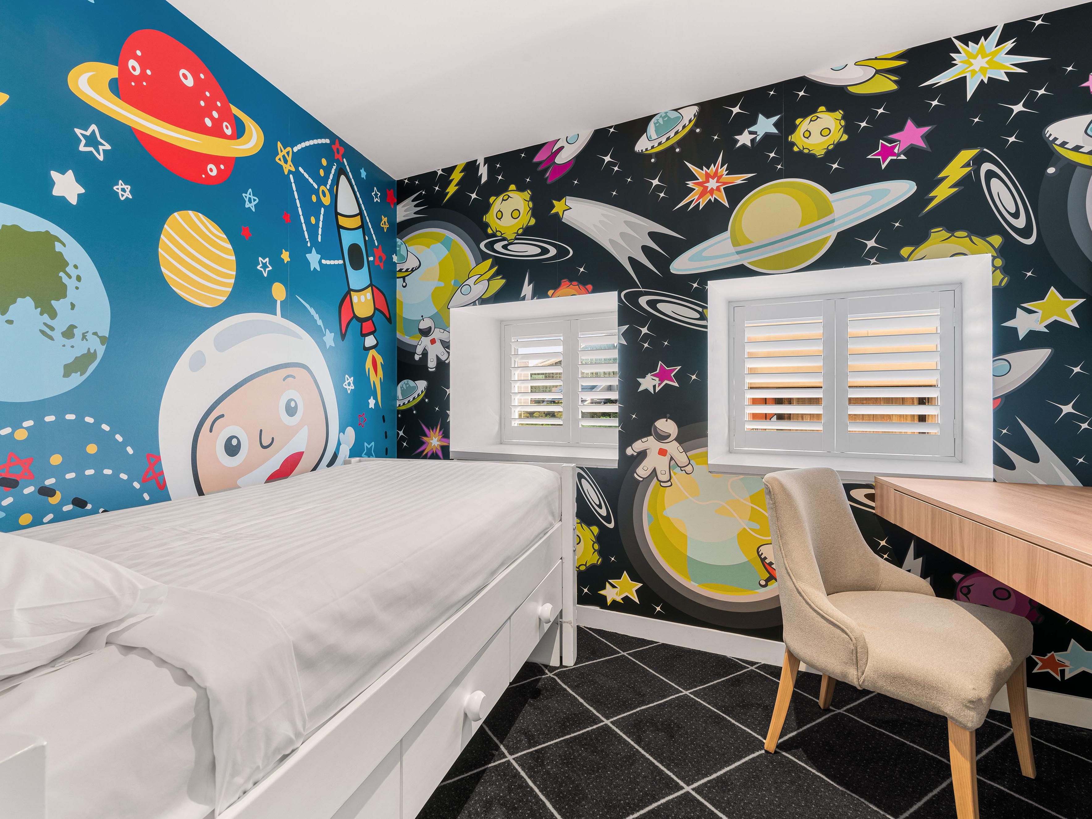 Your little ones will love our unique kids' rooms decorated with space, underwater or animal motifs. 