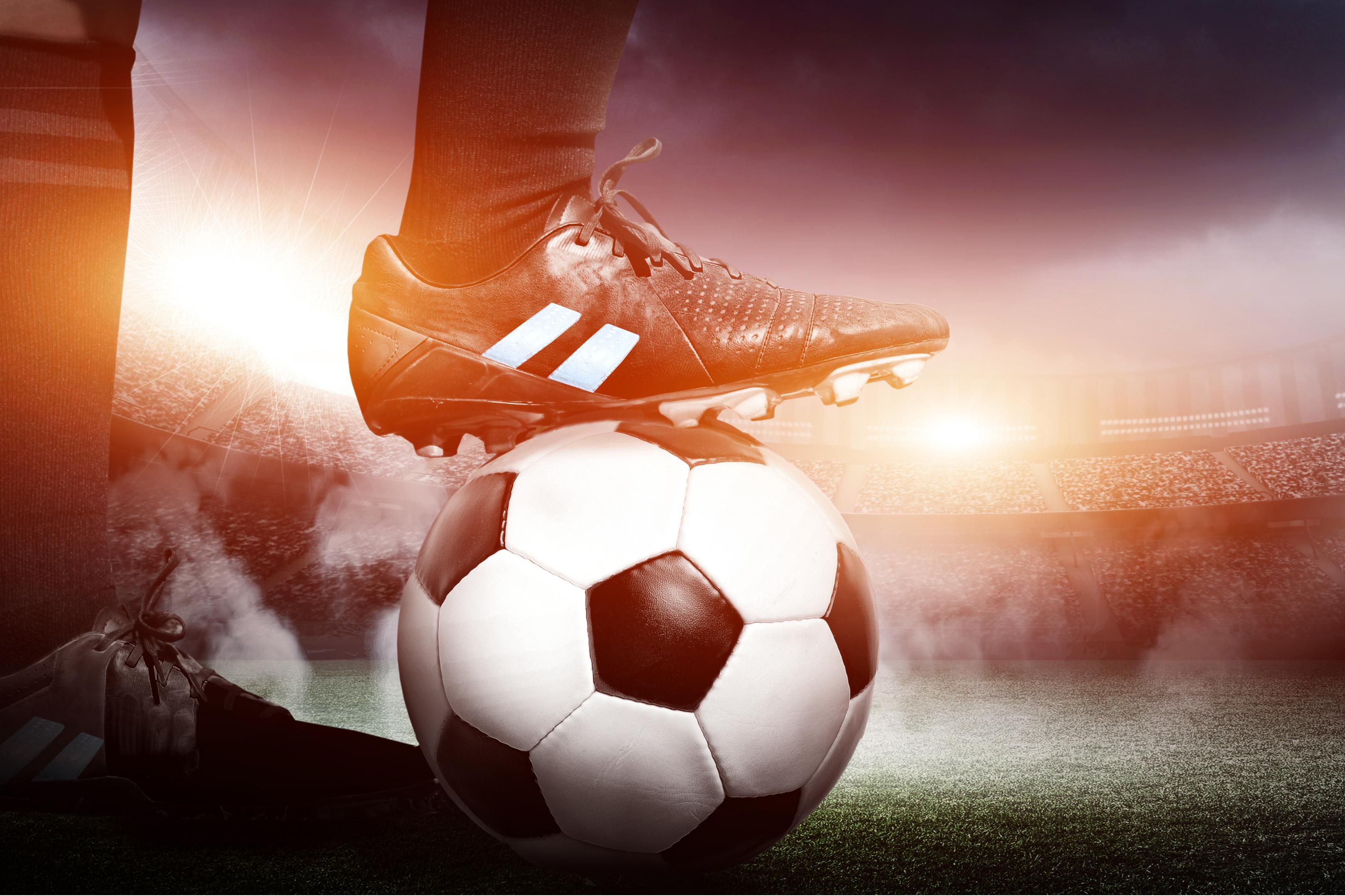 Close-up of a soccer ball on the pitch.