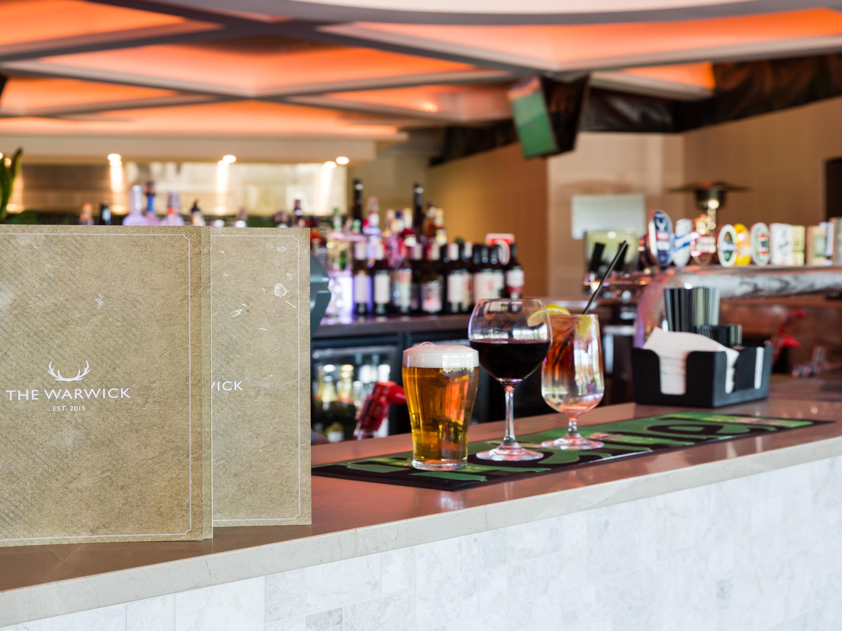 Stay & dine with us in-house at The Warwick Bar, Bistro & Grill. 
Featuring an oversized 360-degree bar, wrap around balcony overlooking parklands, a sun-drenched beer garden, TAB facilities, VIP lounge & an extensive menu specialising in honest pub food with a fusion twist. 