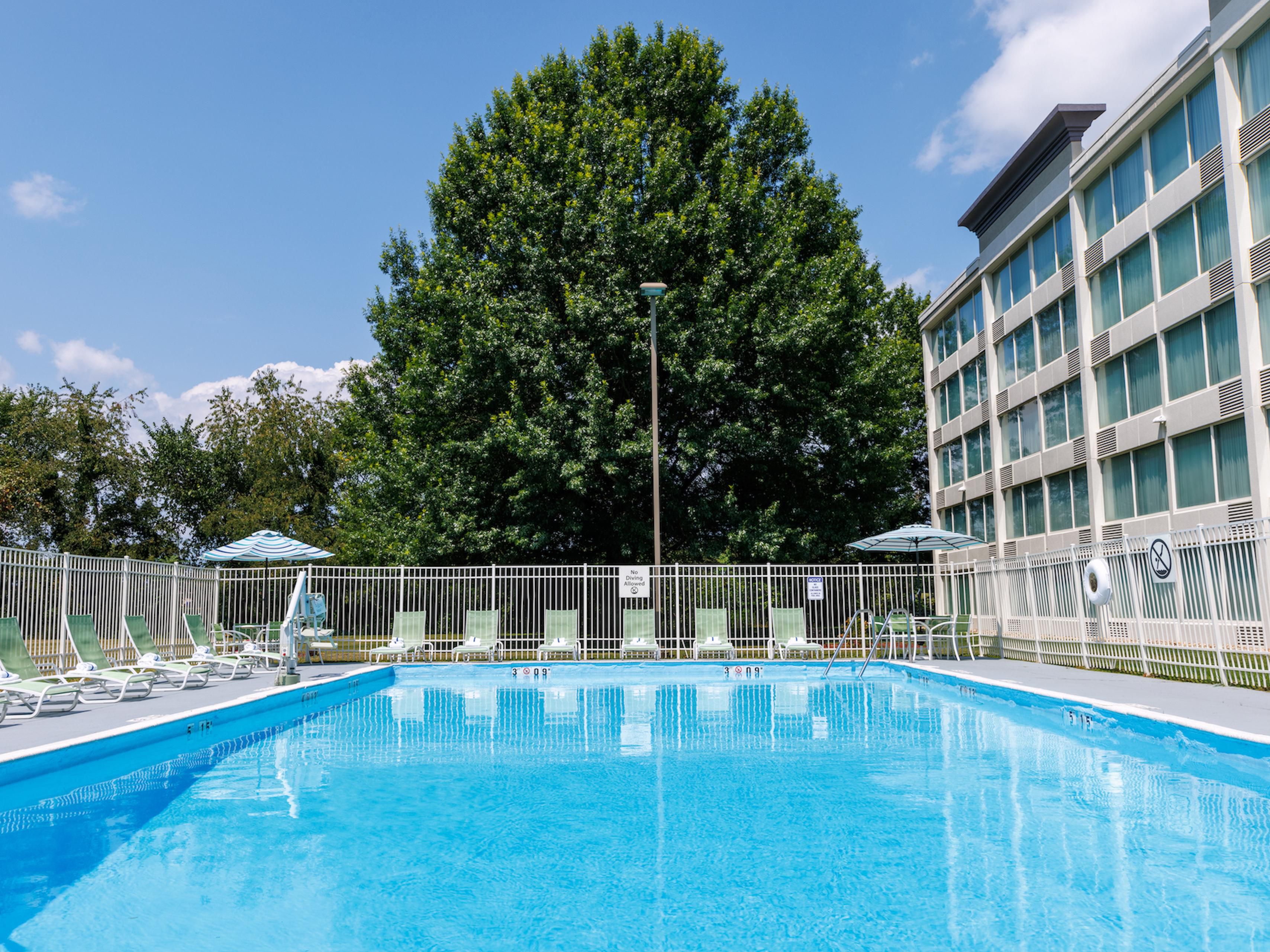 Pack your sunscreen. Our vibrant and inviting pool area is designed to offer guests a delightful retreat from their everyday routines. As you step into this oasis, you're greeted by the sight of crystal-clear waters shimmering under the warm sun, inviting you to take a refreshing dip.