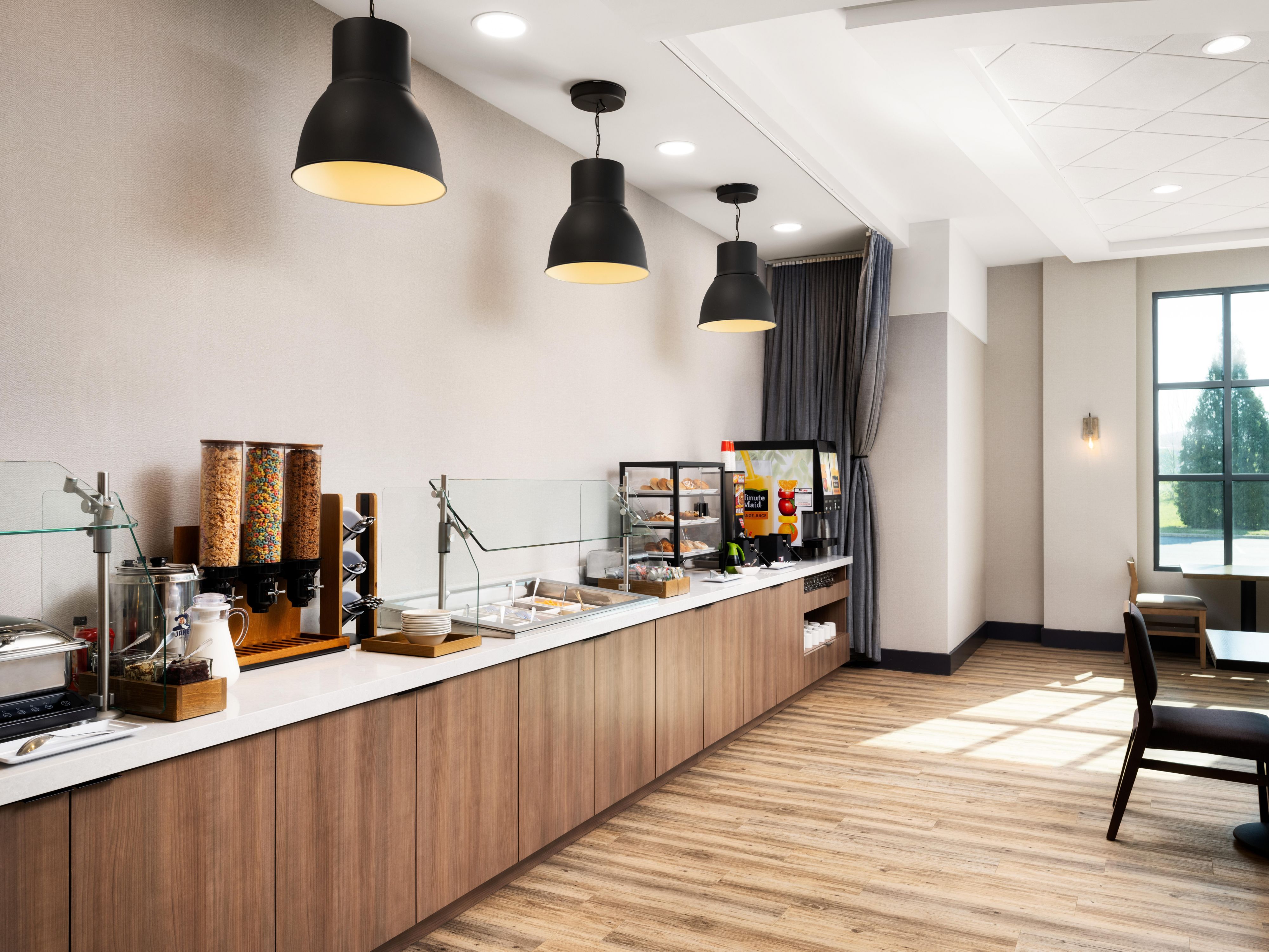 Our on-site breakfast restaurant features cinnamon rolls, scones, scrambled eggs, sausage, Belgian waffles, oatmeal, & Chobani parfait bar. Breakfast buffet can be purchased for $7.95 per person.