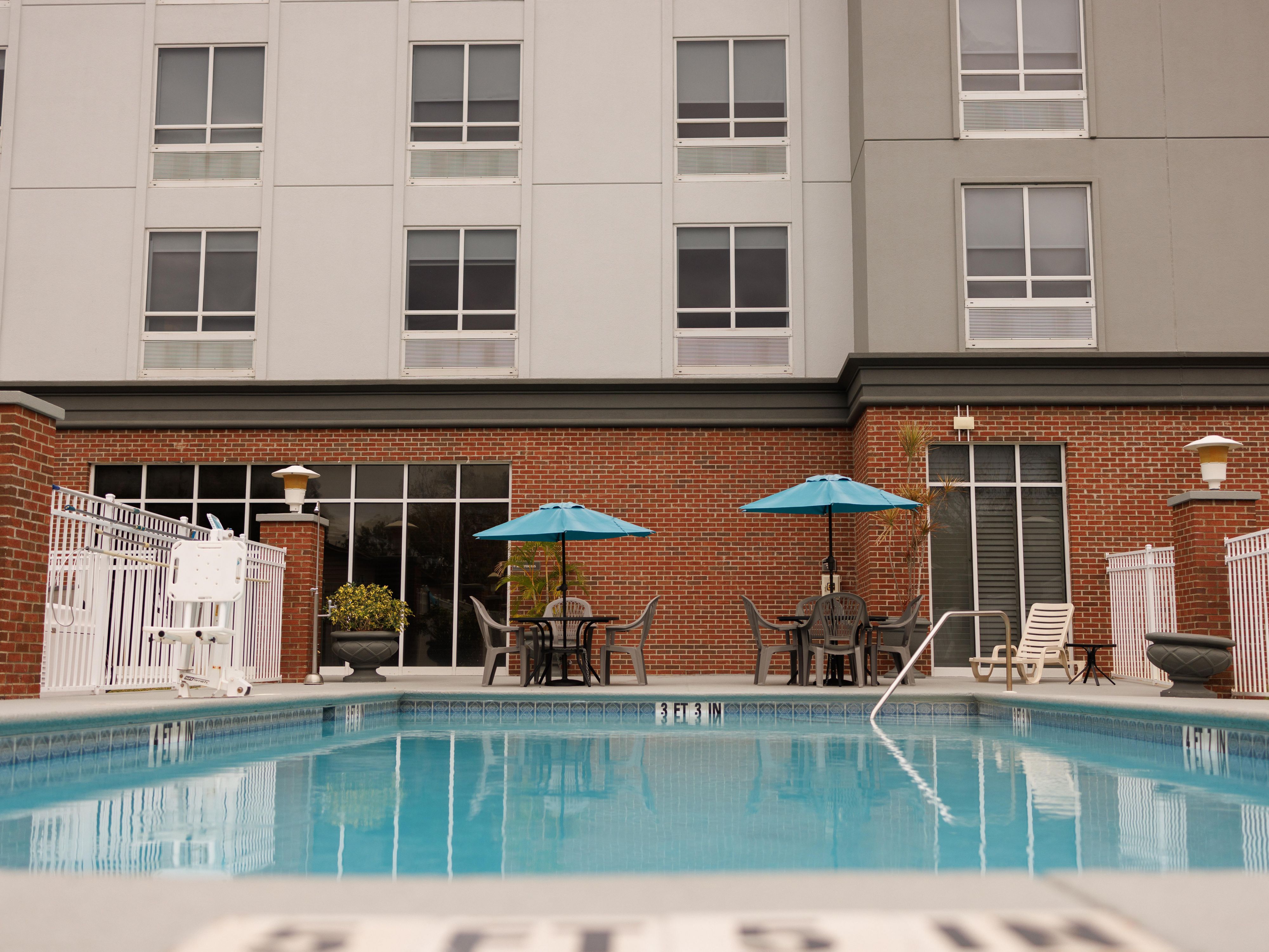Take a refreshing dip in our outdoor swimming pool.