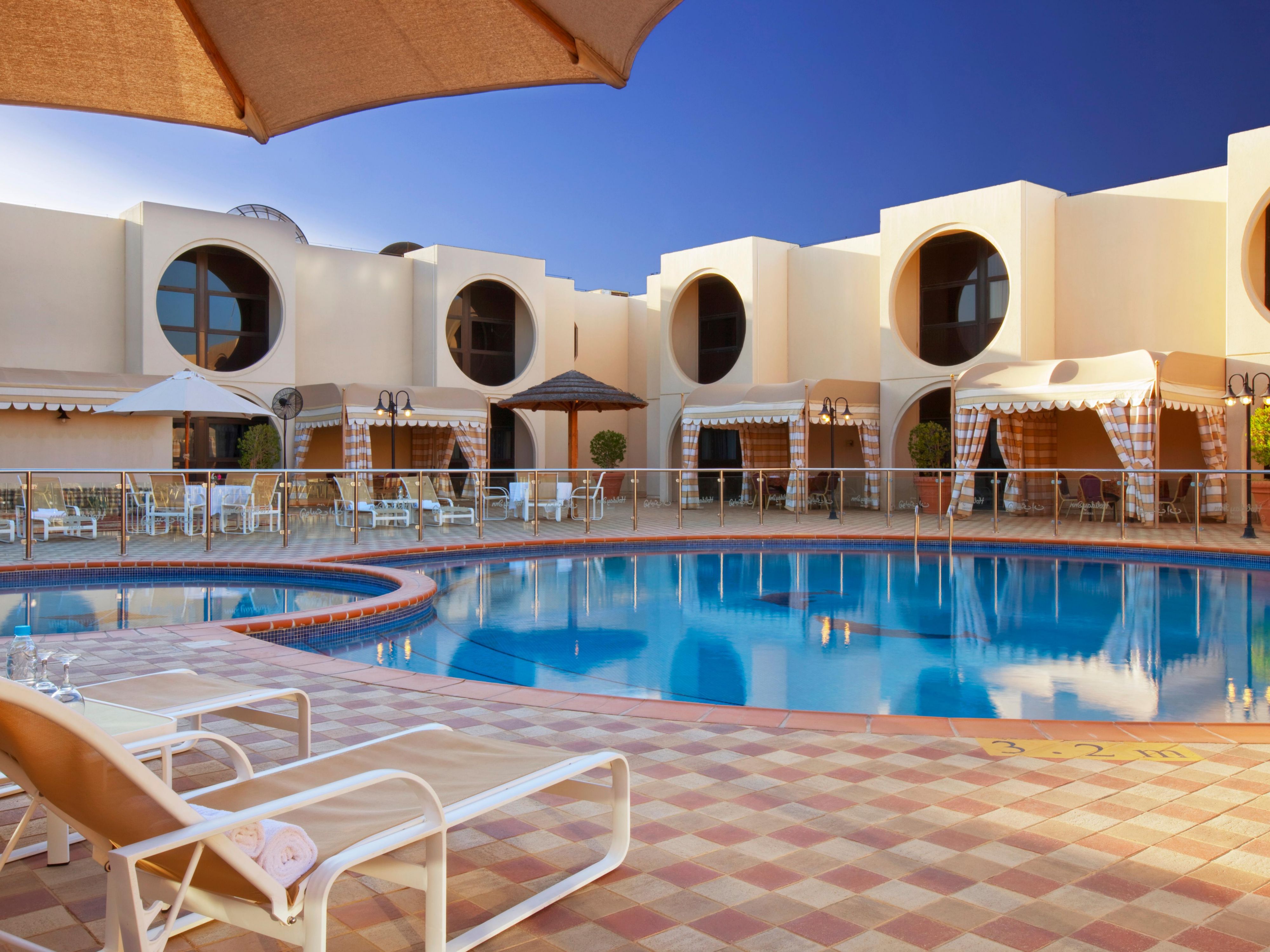 Outdoor swimming pool with summer swimming classes for both men and children at special rates for non-members.