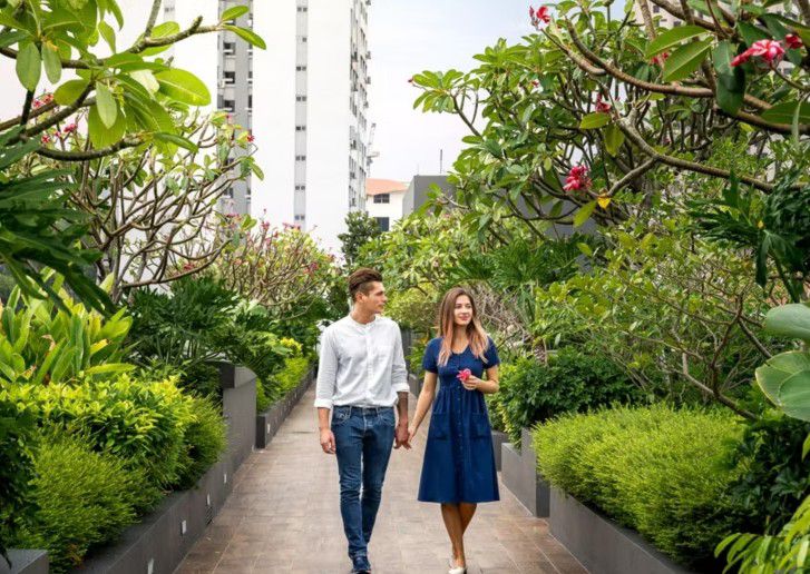 Hotel lobby with curved furniture and greenery