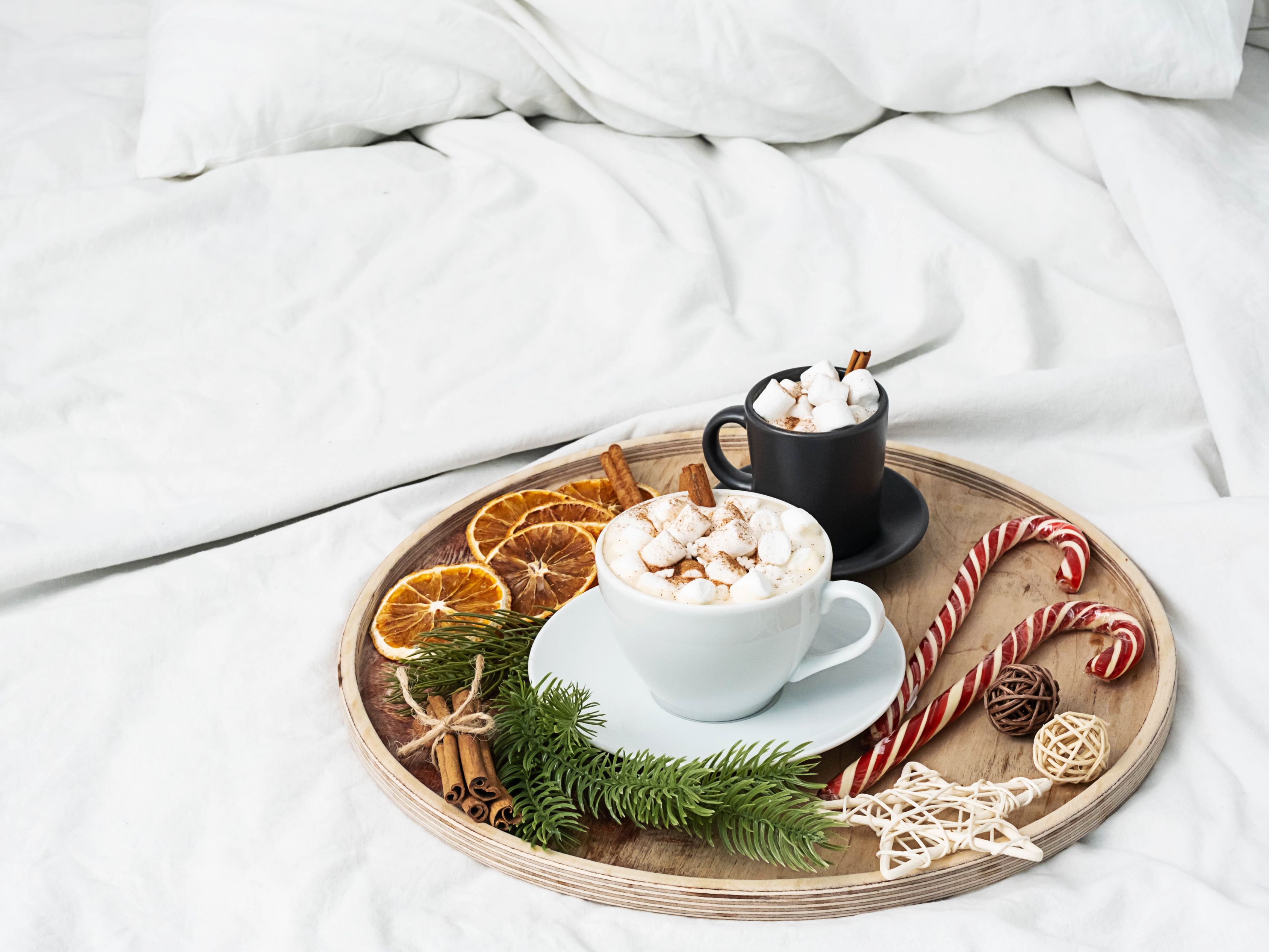 Hot chocolate on a tray with toppings.
