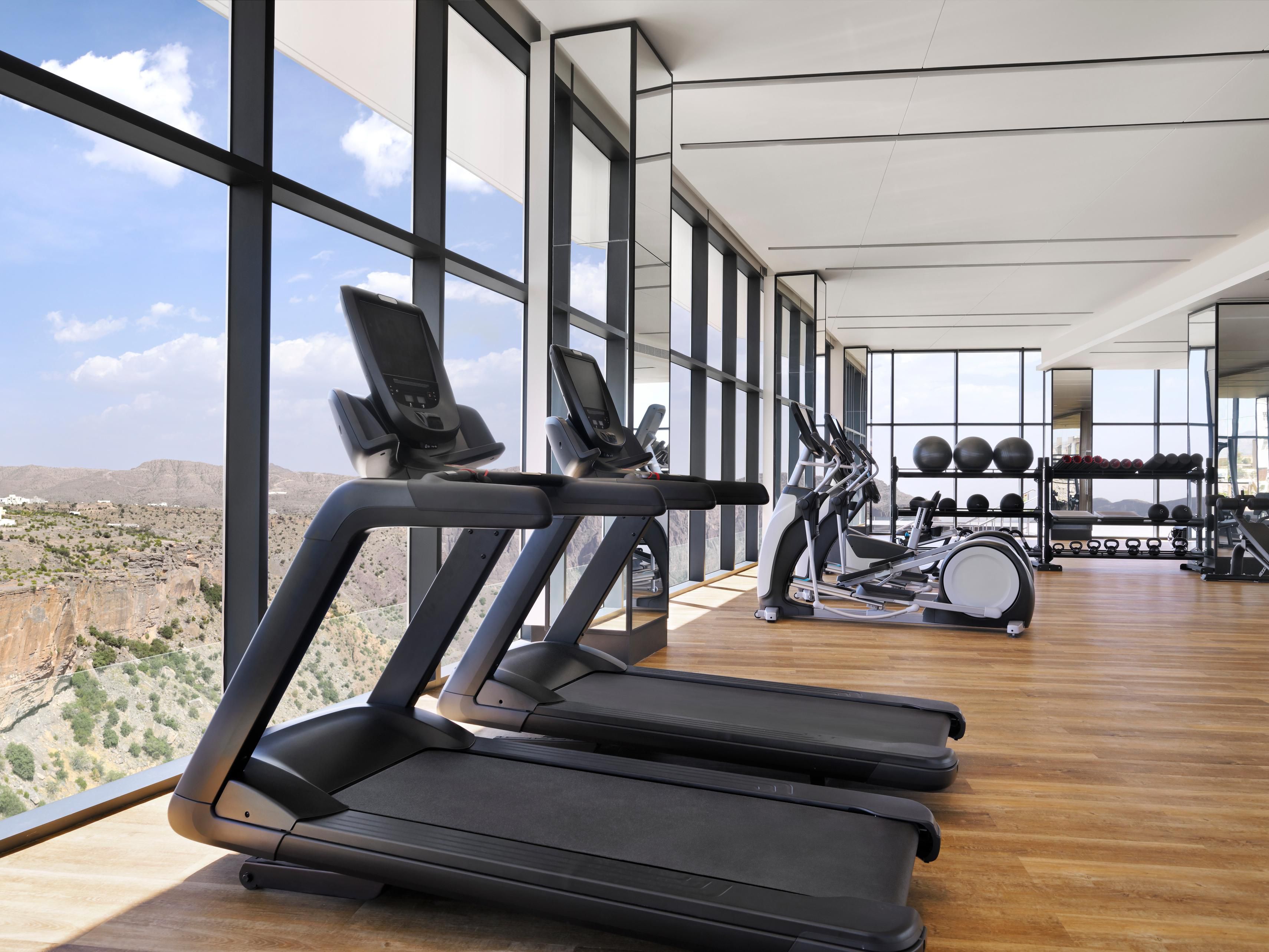 Work out in the gym with breathtaking views of the mountain peaks