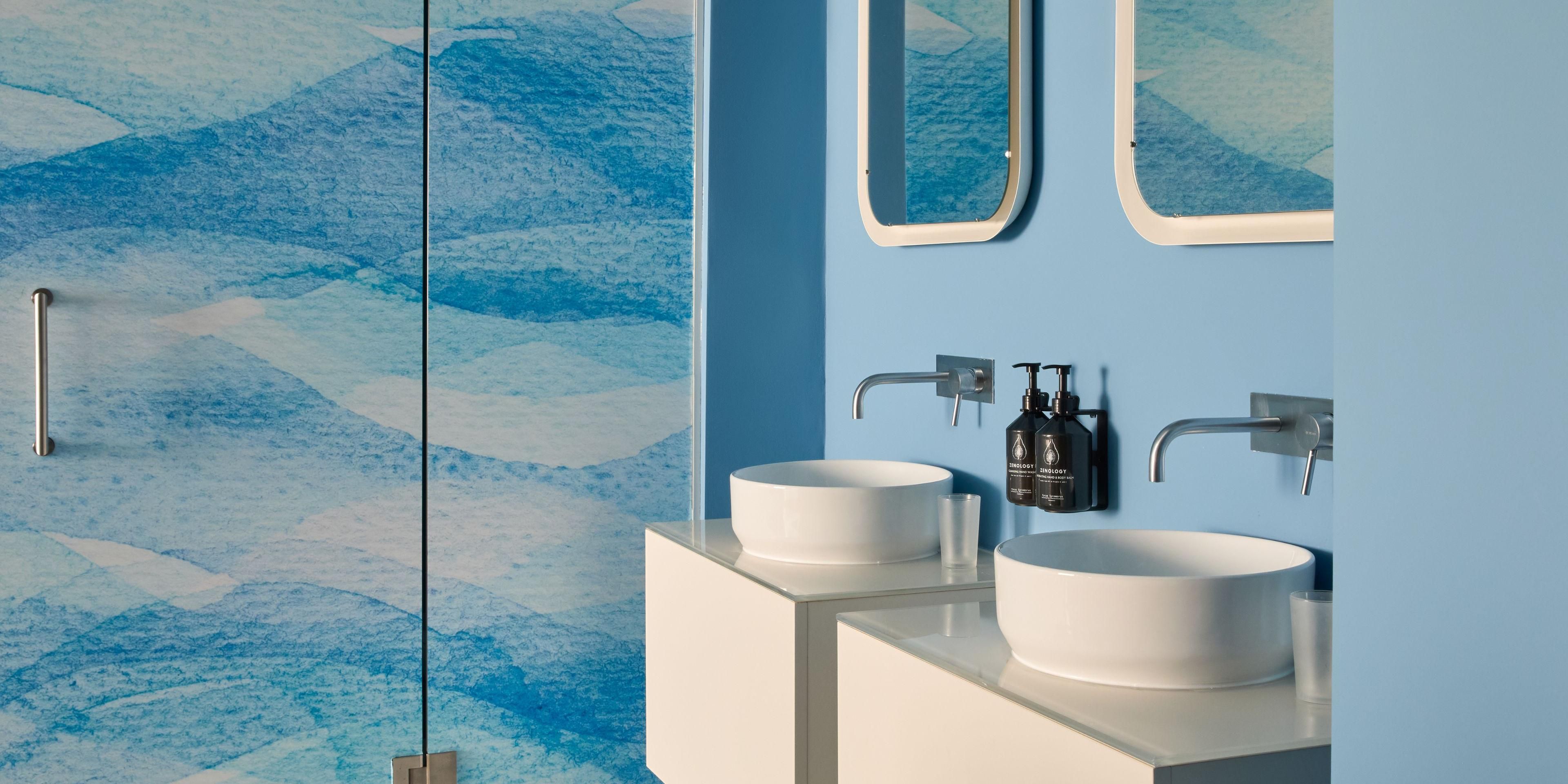 Get ready in a spacious bathroom included in all hotel rooms.