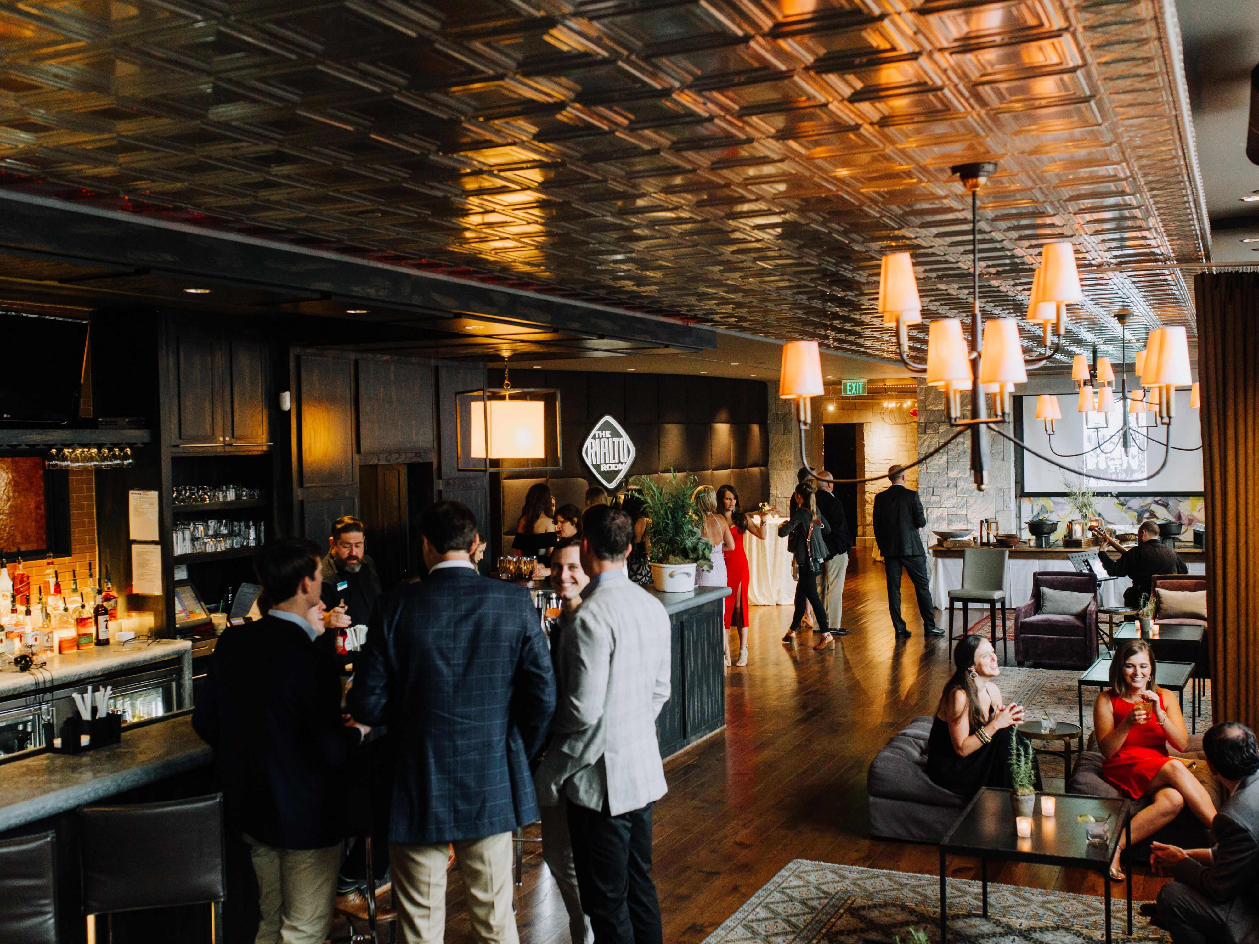 Our Rialto Club offers a chic alternative to stuffy boardrooms and cookie-cutter venues. Whether you're hosting a corporate event, reuniting with former classmates, or dancing the night away with wedding guests, our downstairs private event space is the place to make it happen -- with premium bar selections, tasty catering options, and AV support.