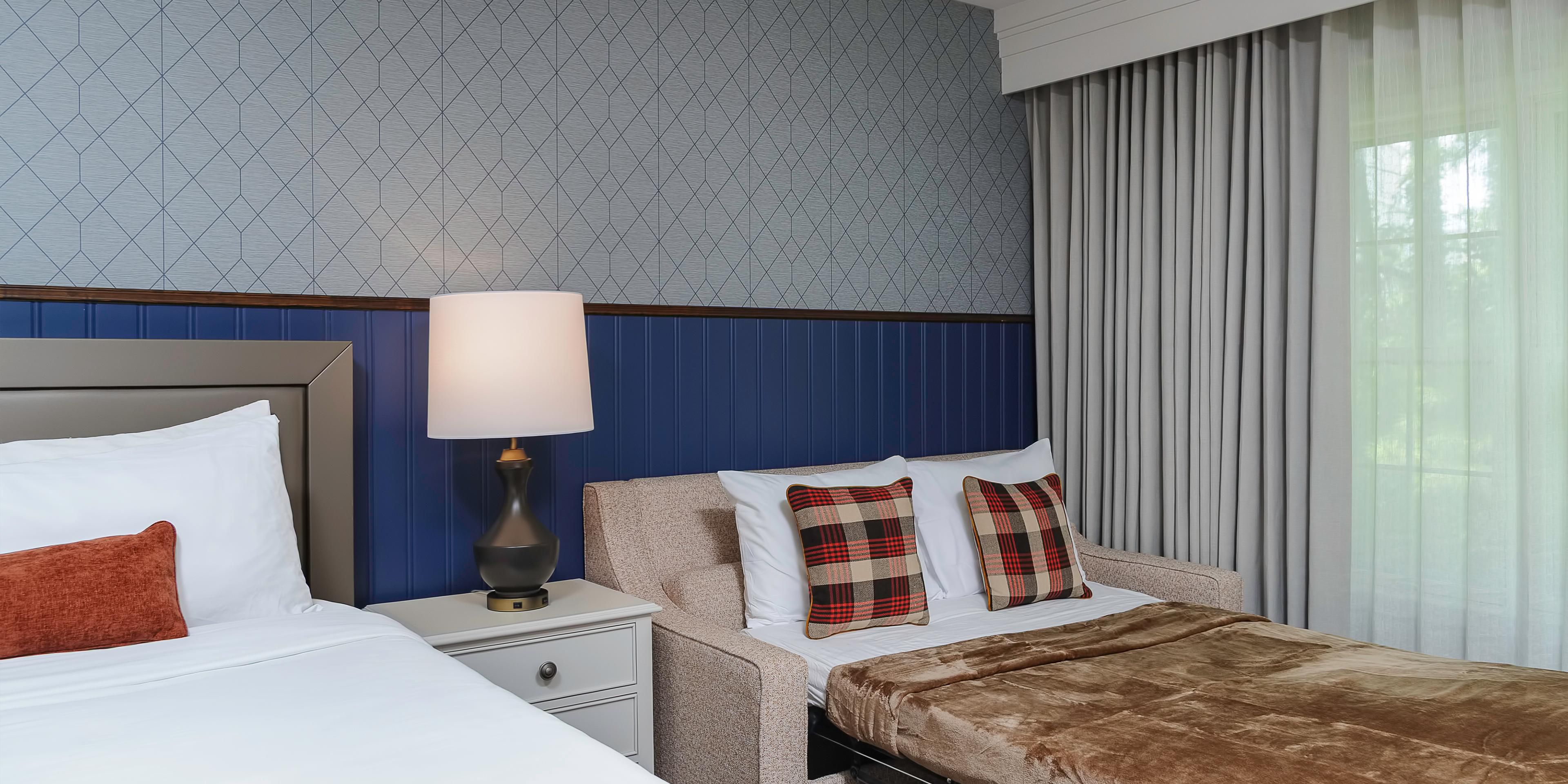 Comfortable king guest room with sofa bed for families