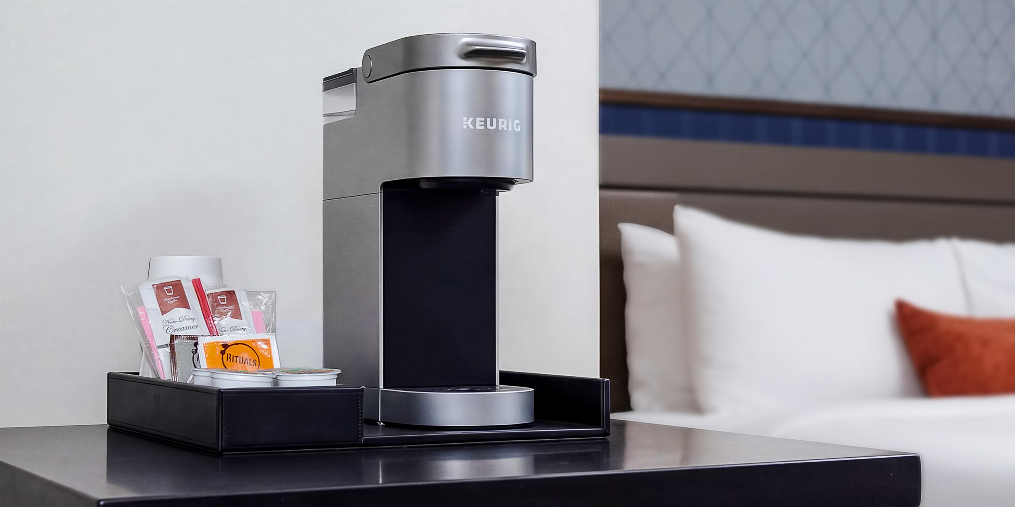 Guest room coffee station with mini refrigerator in Vinings