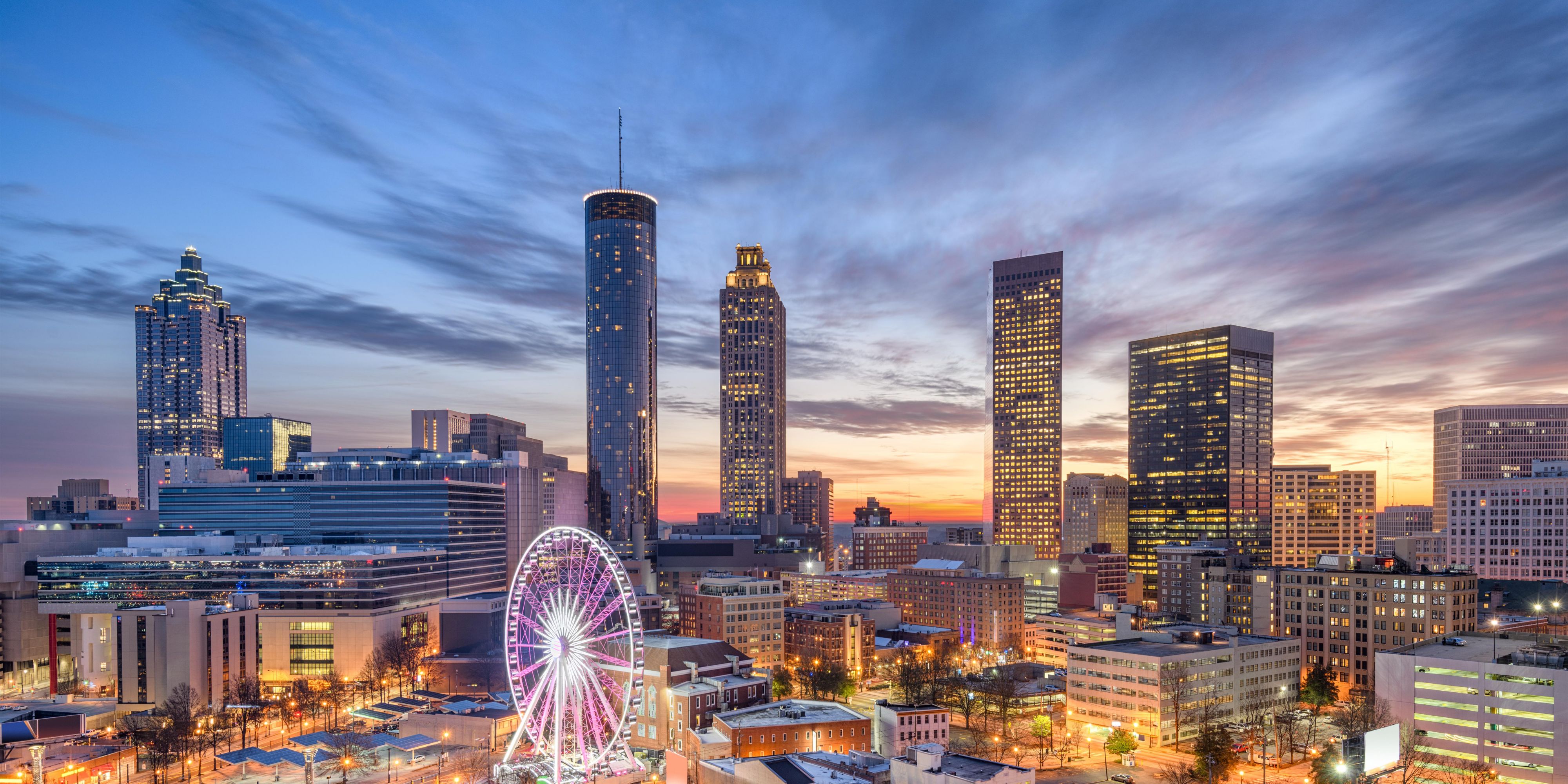 Atlanta's skyline sparkles at night as a beacon of urban charm.
