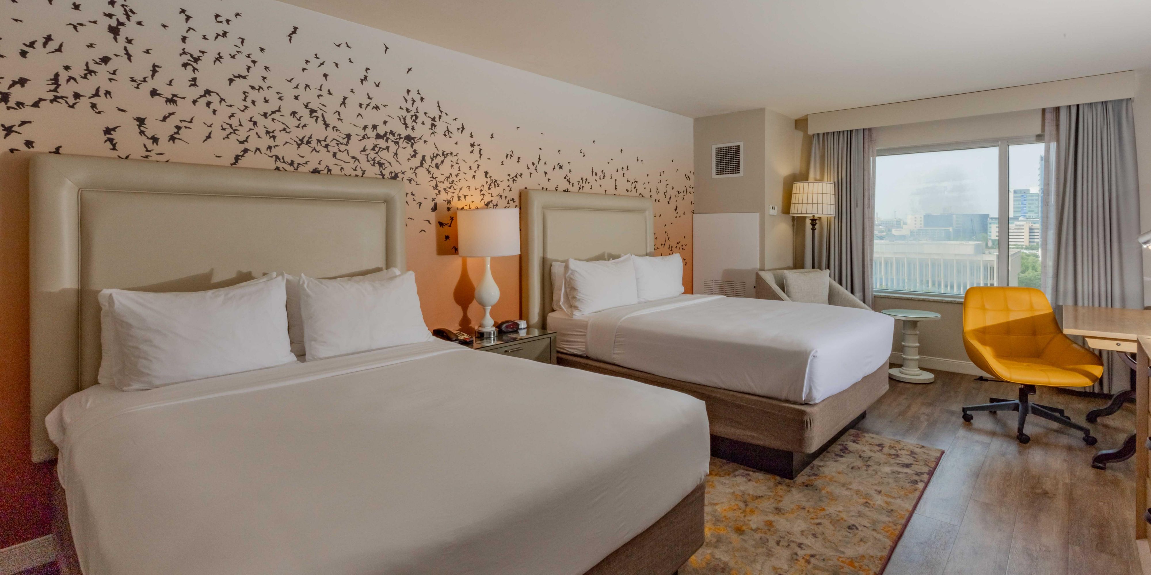 Our spacious 2 Queen Bed guest rooms are perfect for family stays.