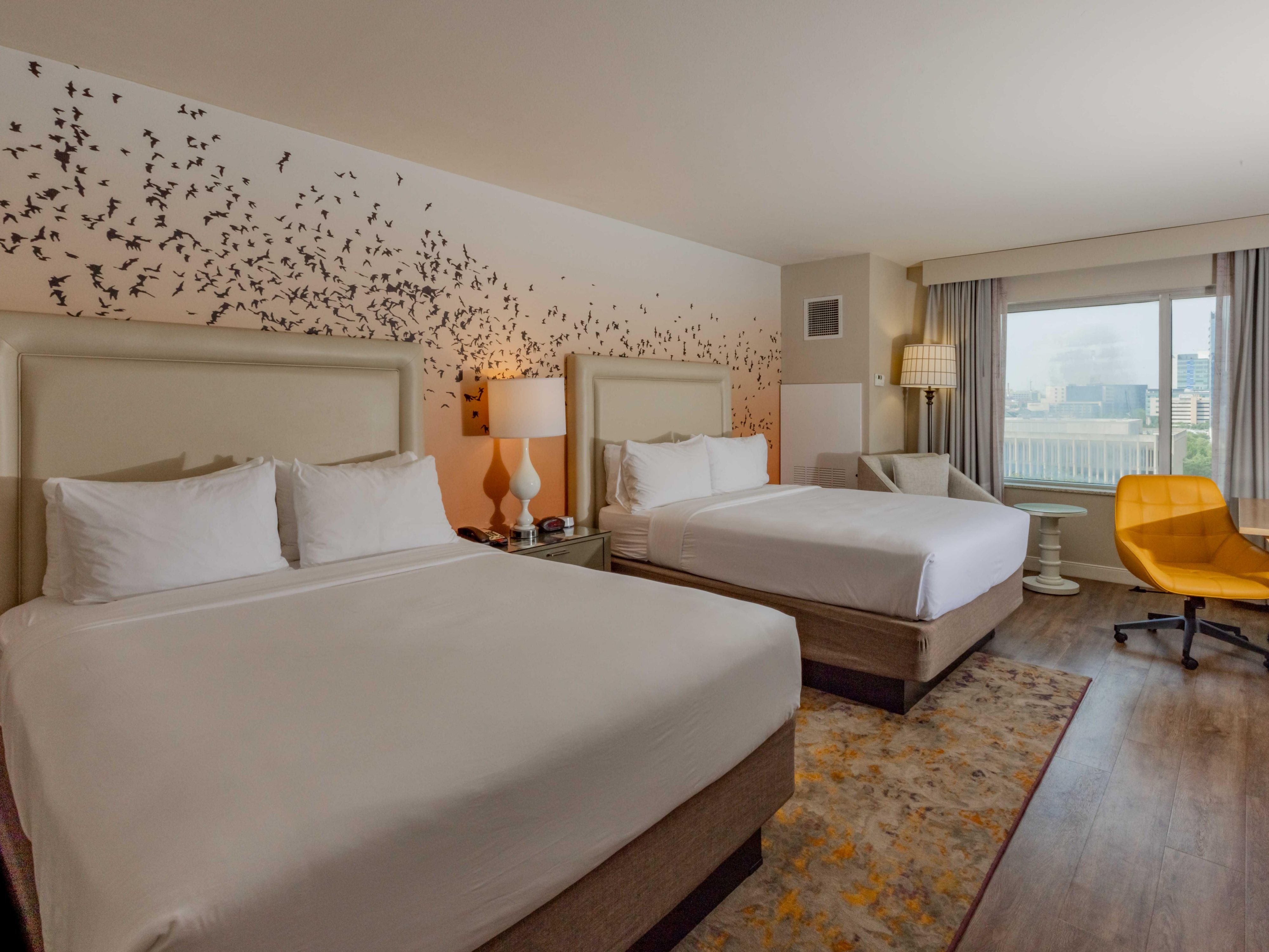 Our spacious 2 Queen Bed guest rooms are perfect for family stays.