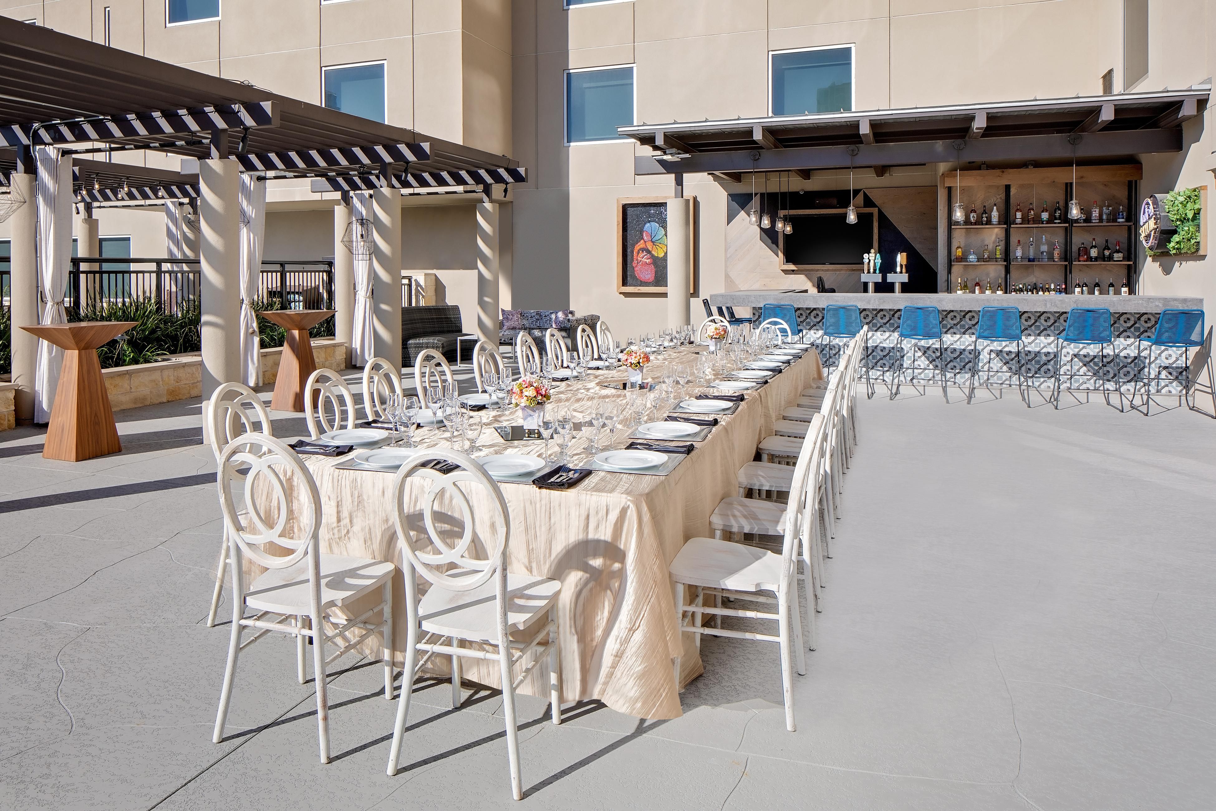 rooftop event area with a wedding table set up