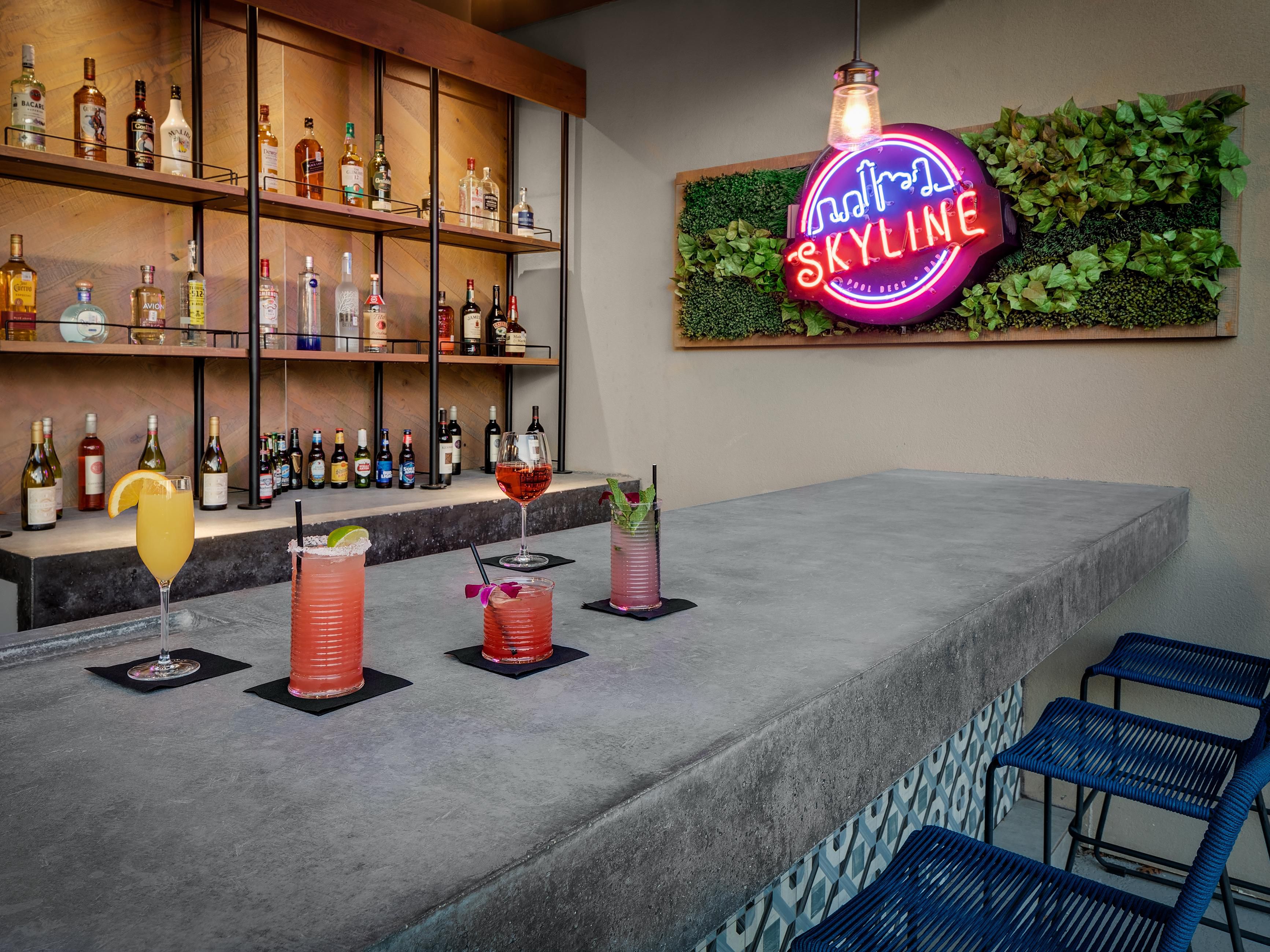Toast to Austin nights at our downtown Skyline Rooftop Bar.