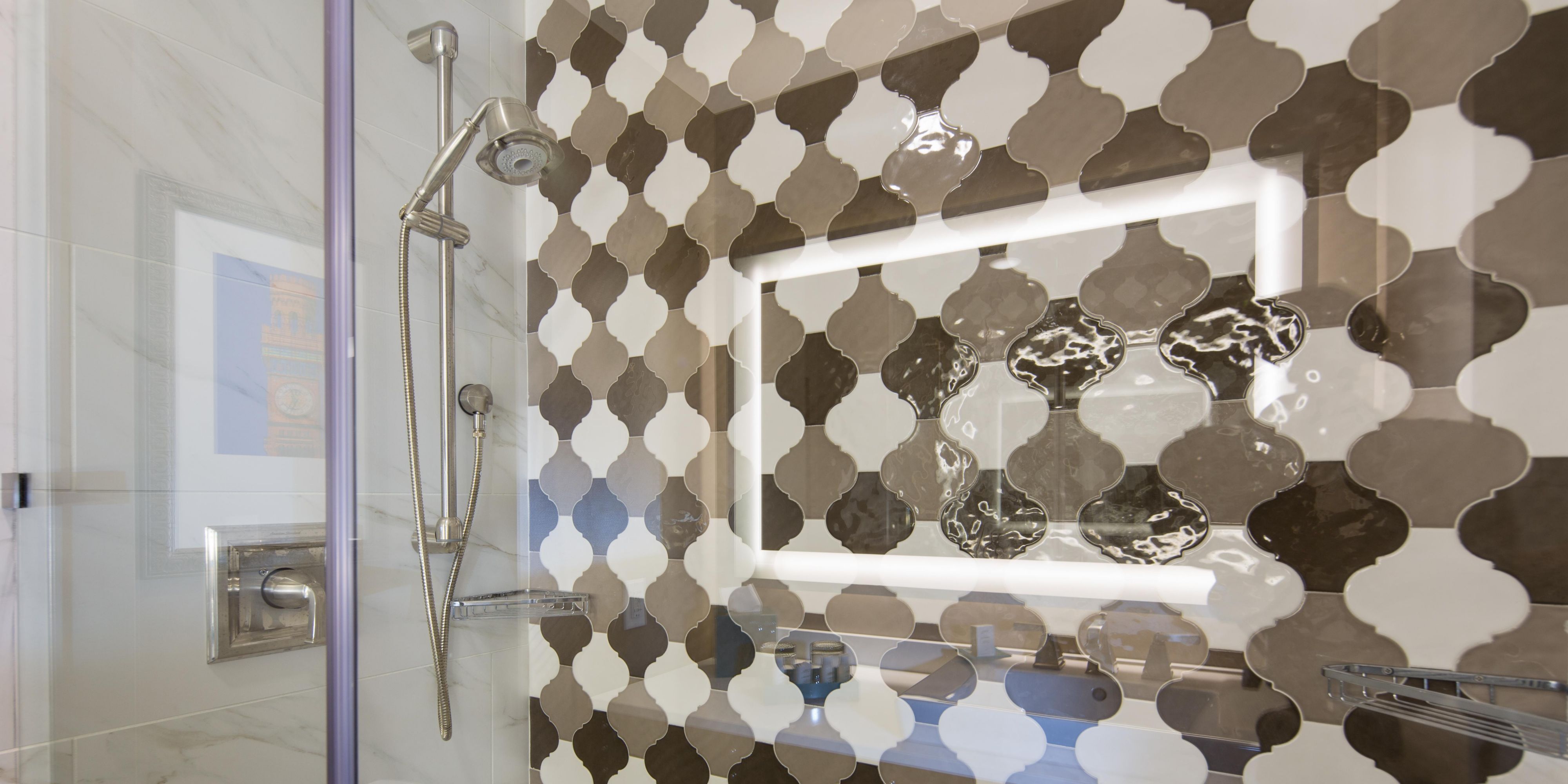 Our Deluxe bathrooms feature a luxurious head shower.