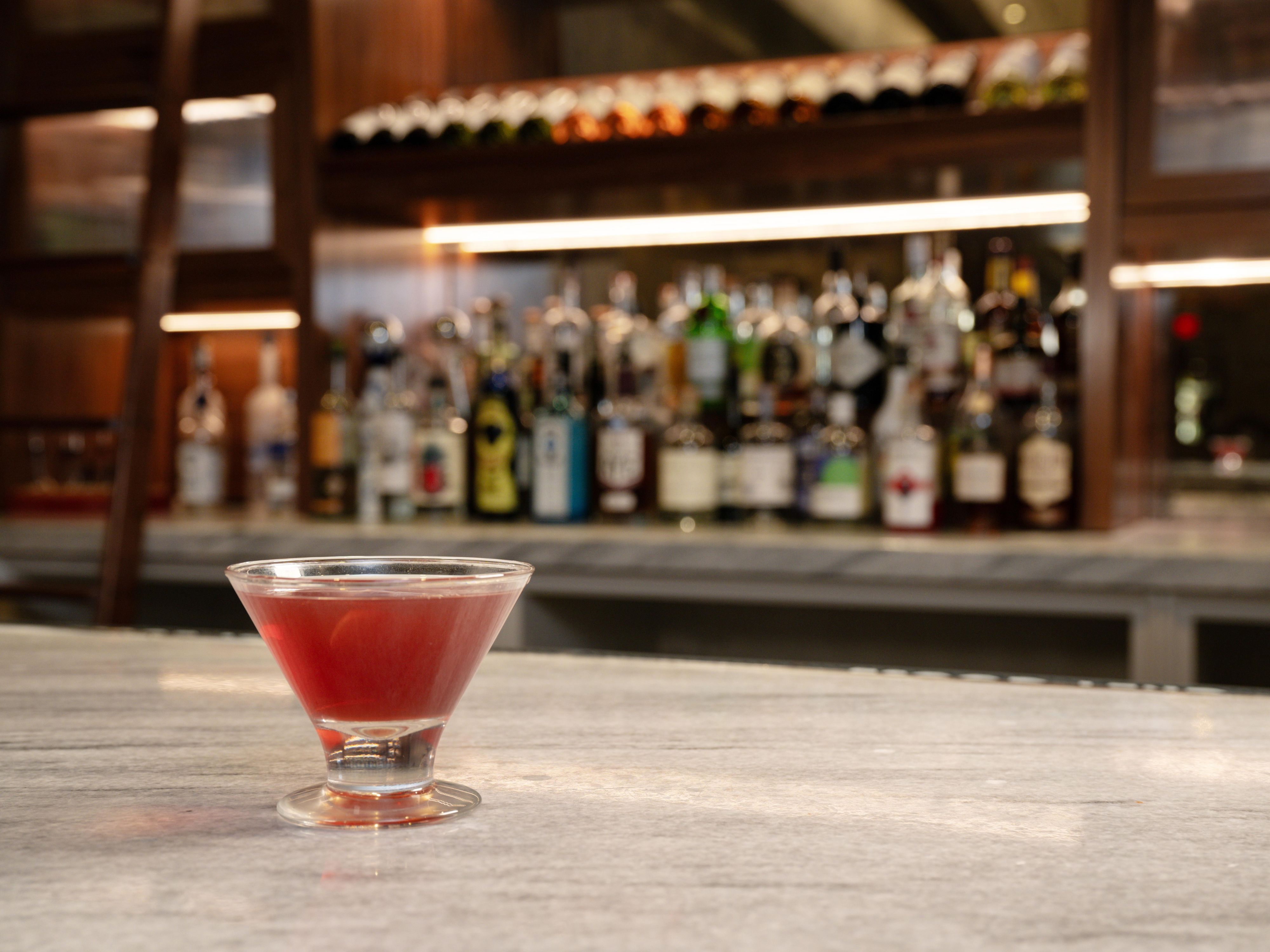 hand crafted cocktail and Poets