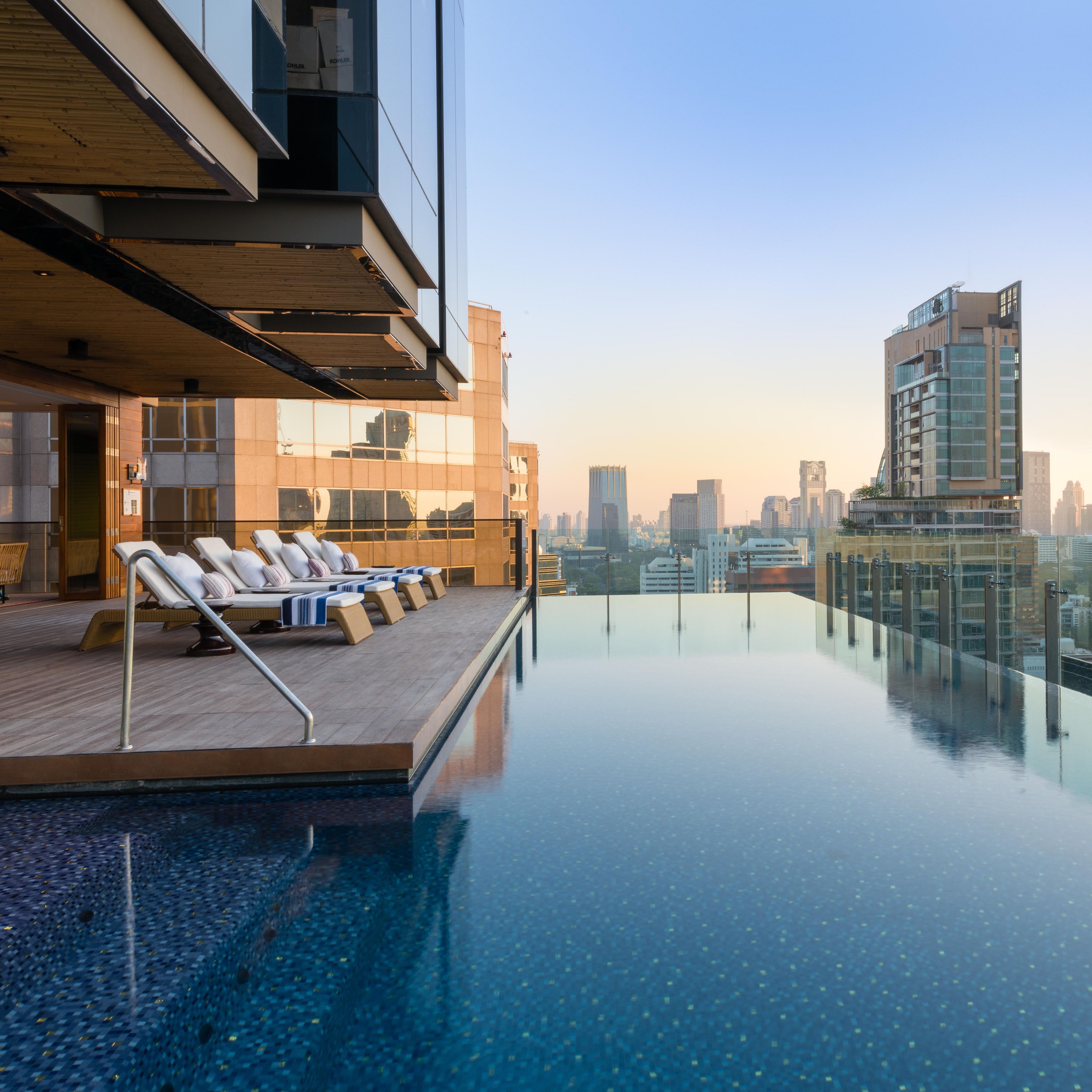 Enjoy the beautiful infinity edge pool with great views of Bangkok