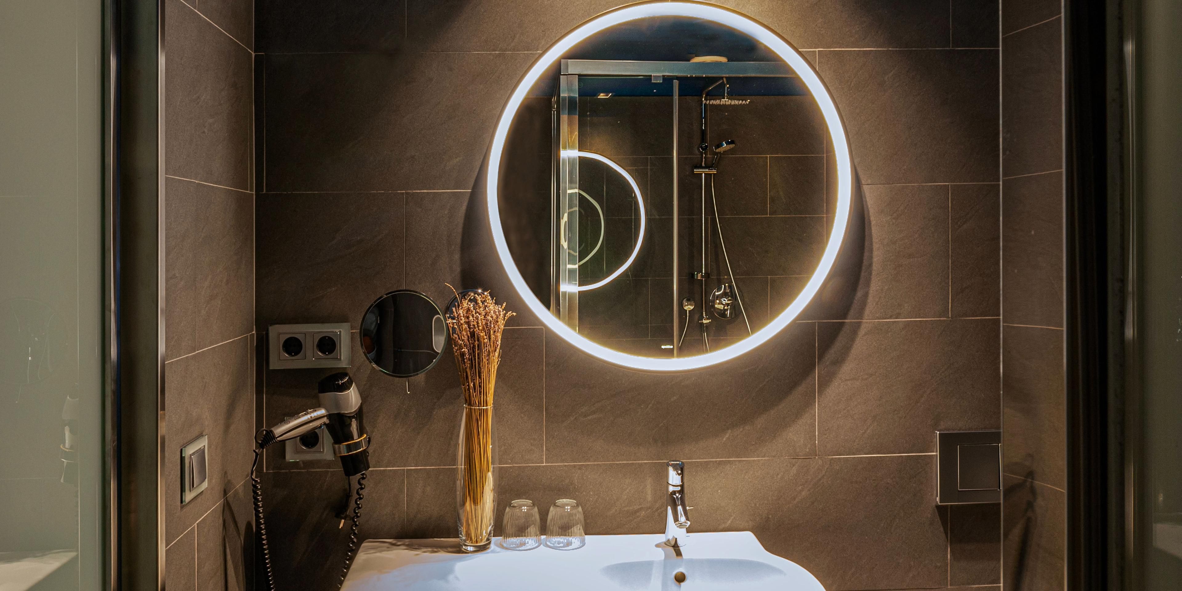 Illuminate your routine with our signature backlit mirrors