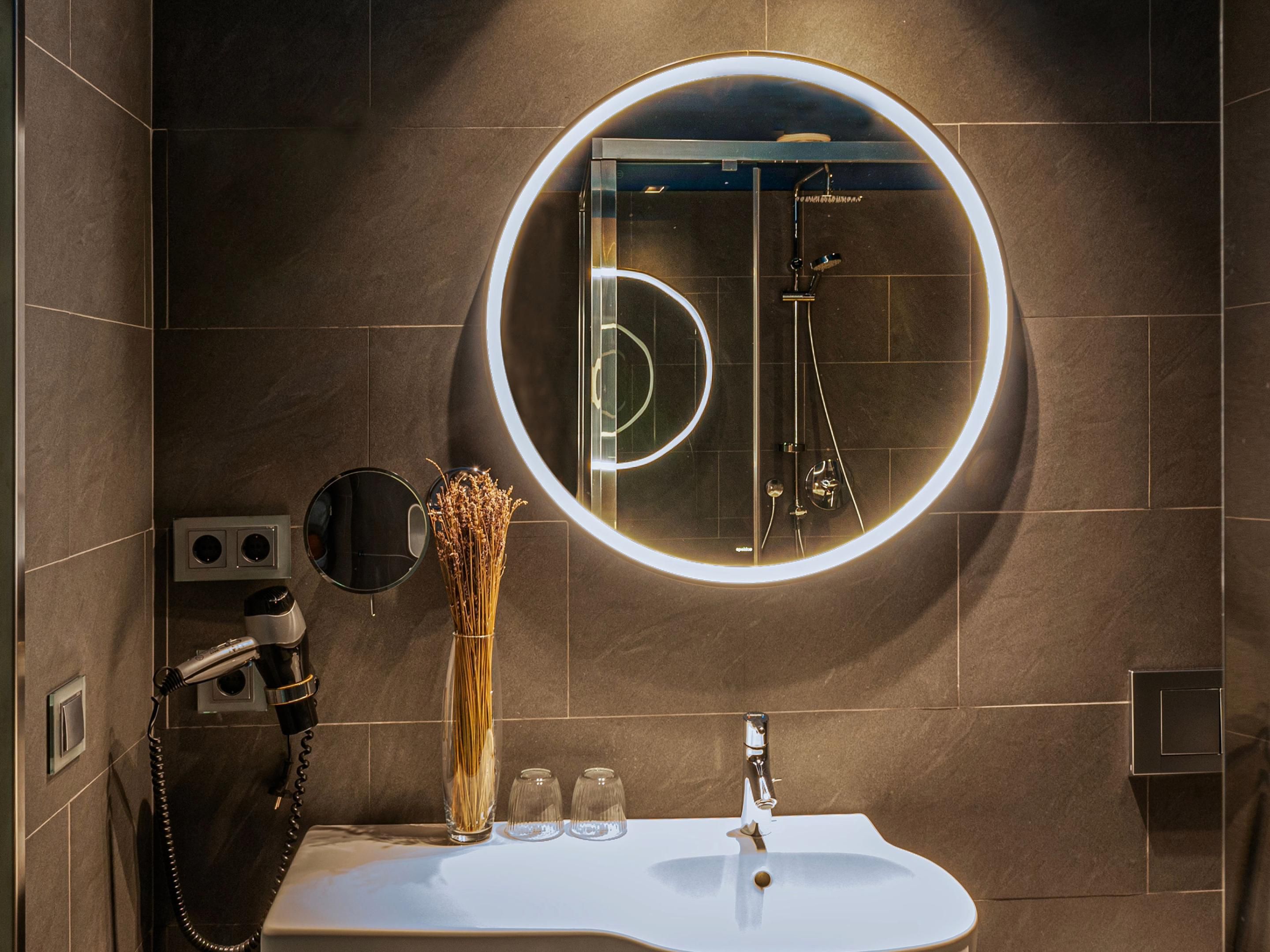 Illuminate your routine with our signature backlit mirrors