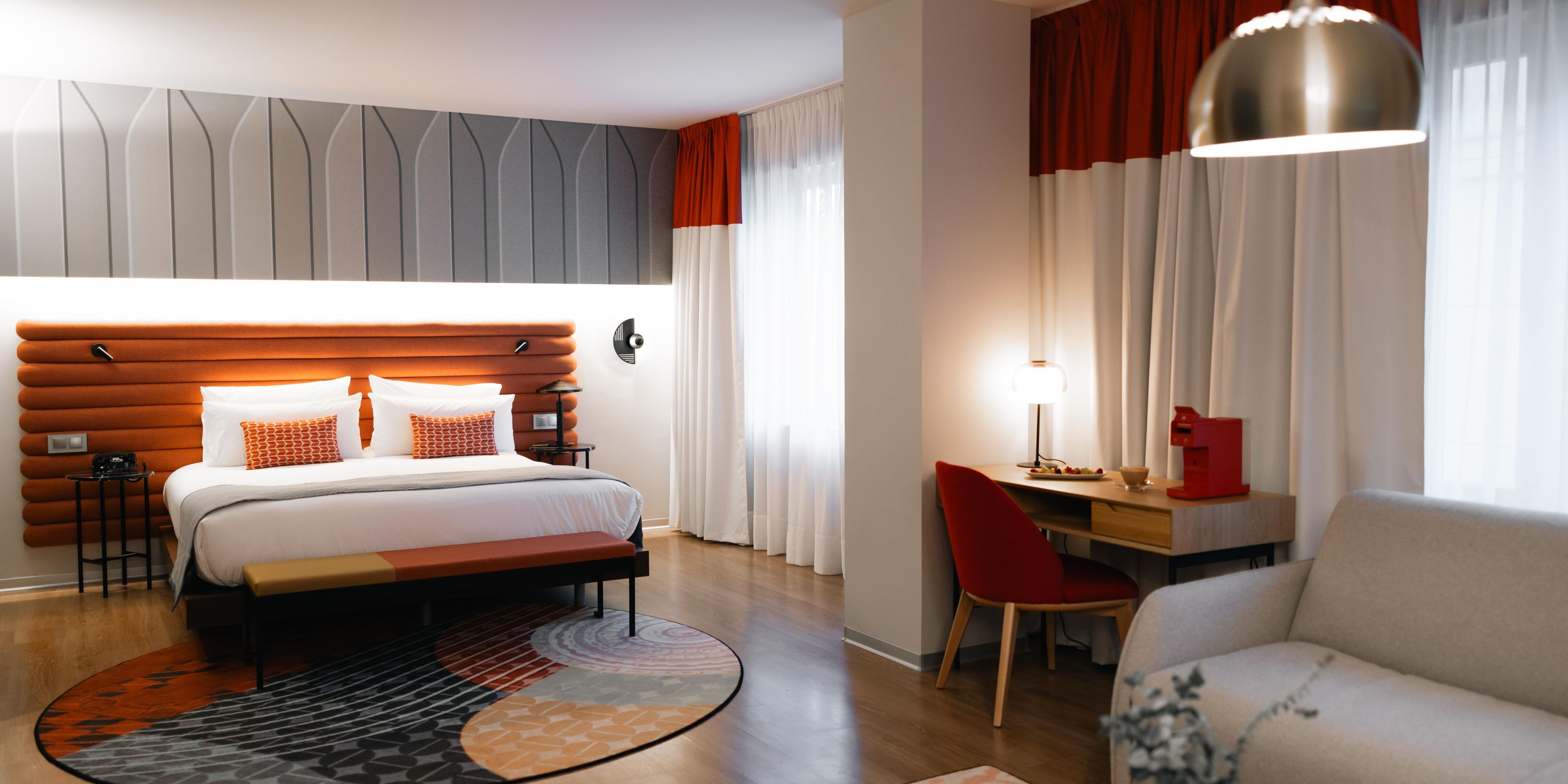 Recharge between city explorations in our designer king suite