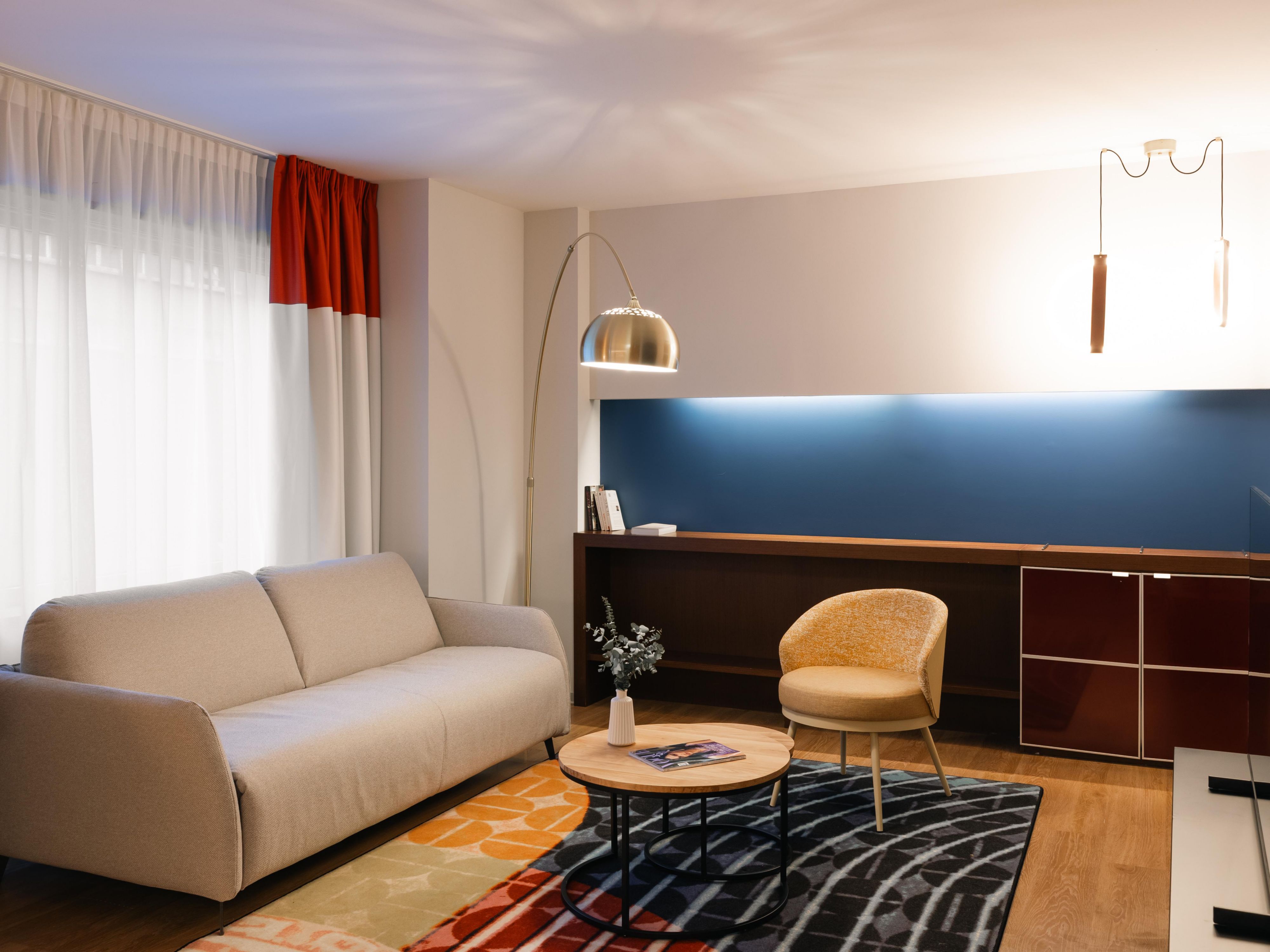 Unwind in the well-appointed living area of your suite.