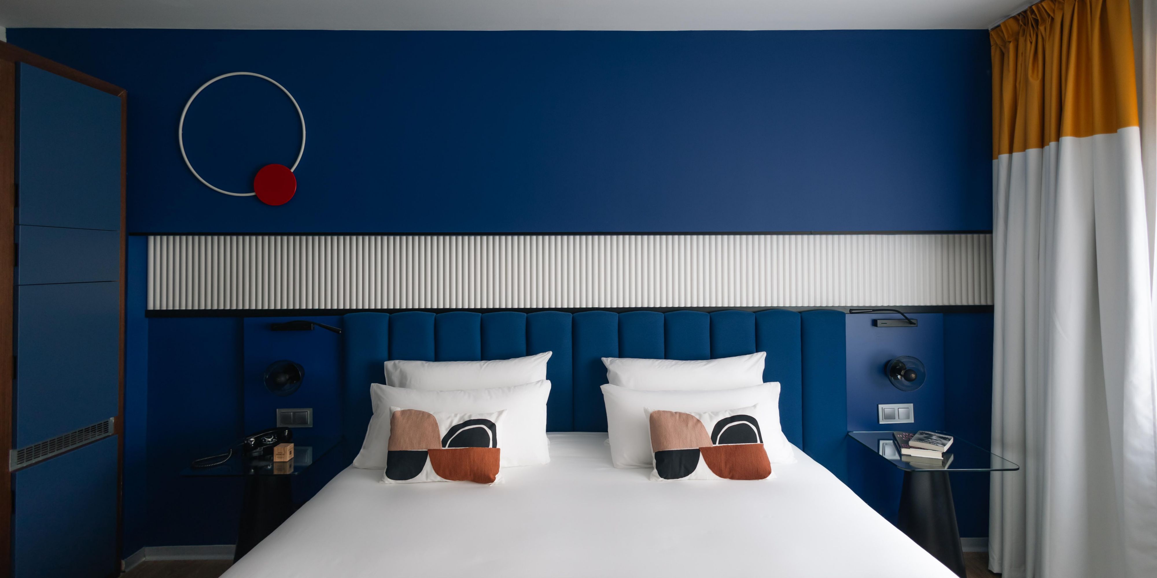Unwind in our vibrant, comfortable guest rooms